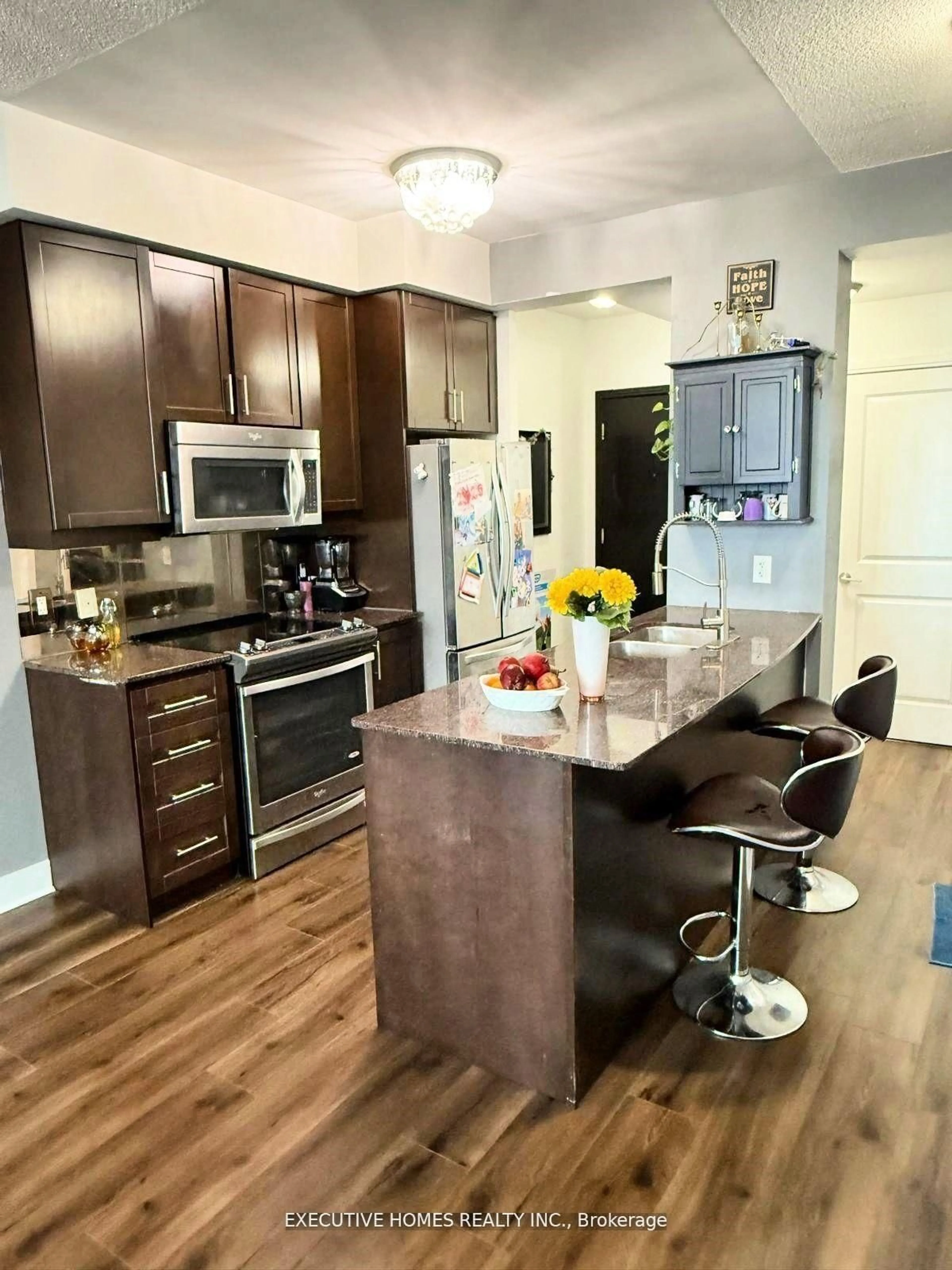 Open concept kitchen, wood/laminate floor for 80 Absolute Ave #1401, Mississauga Ontario L4Z 0A2