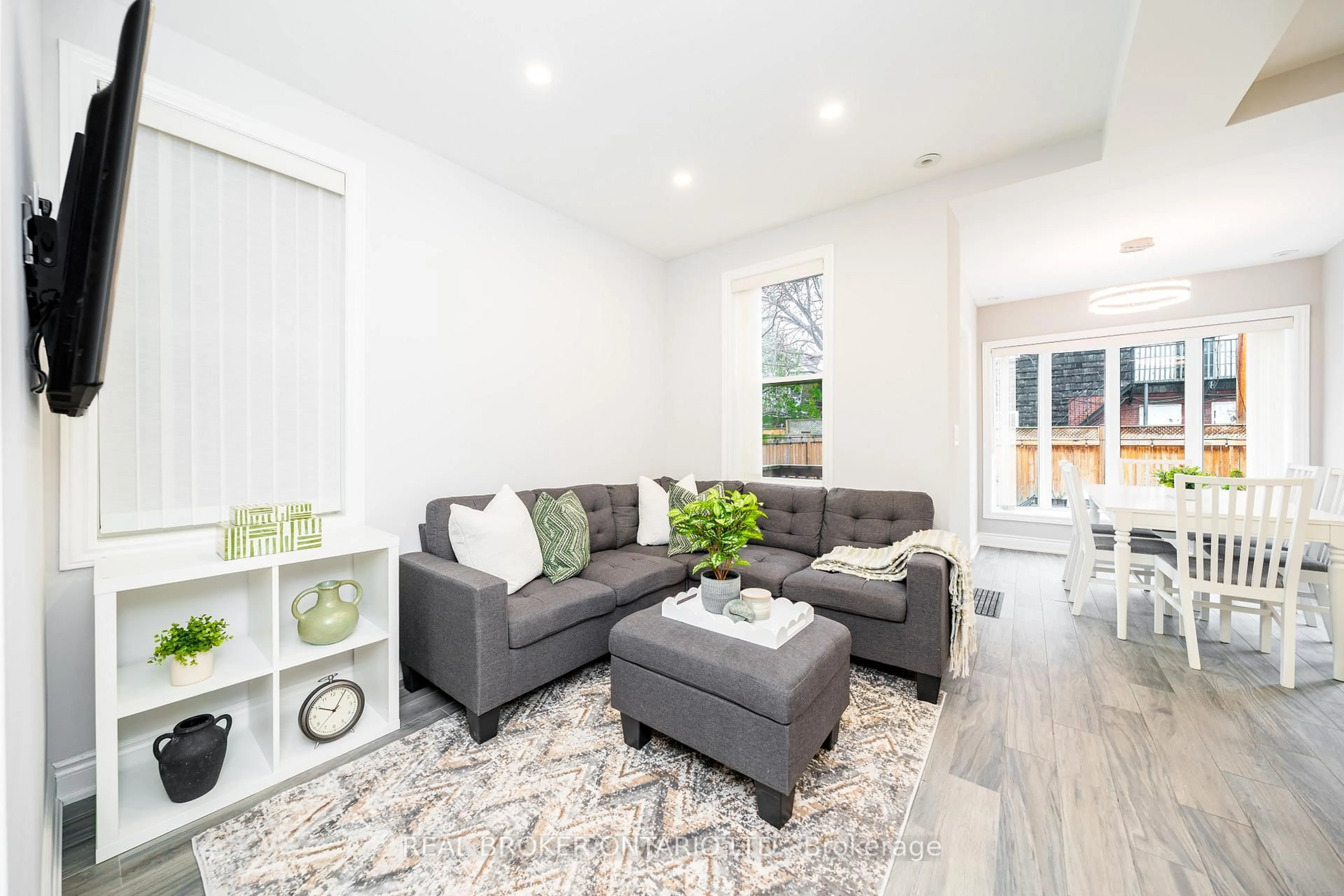 Living room with furniture, unknown for 8 Springhurst Ave, Toronto Ontario M6K 1A9