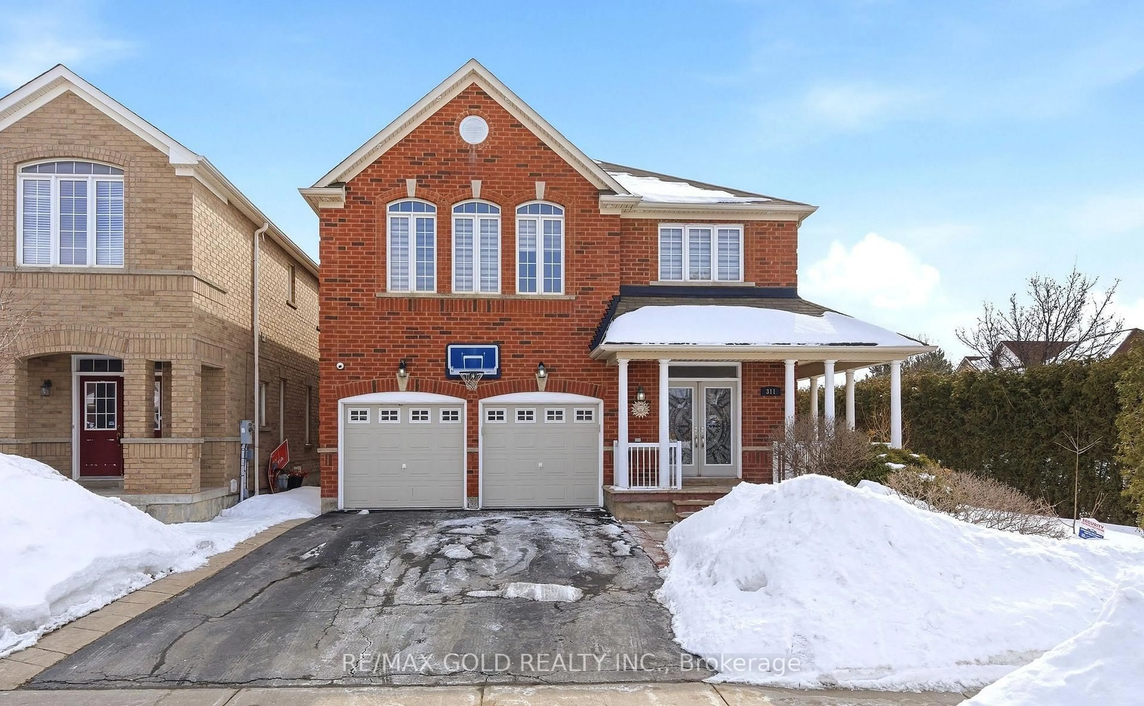 Home with brick exterior material, street for 311 Father Tobin Rd, Brampton Ontario L6R 0P4
