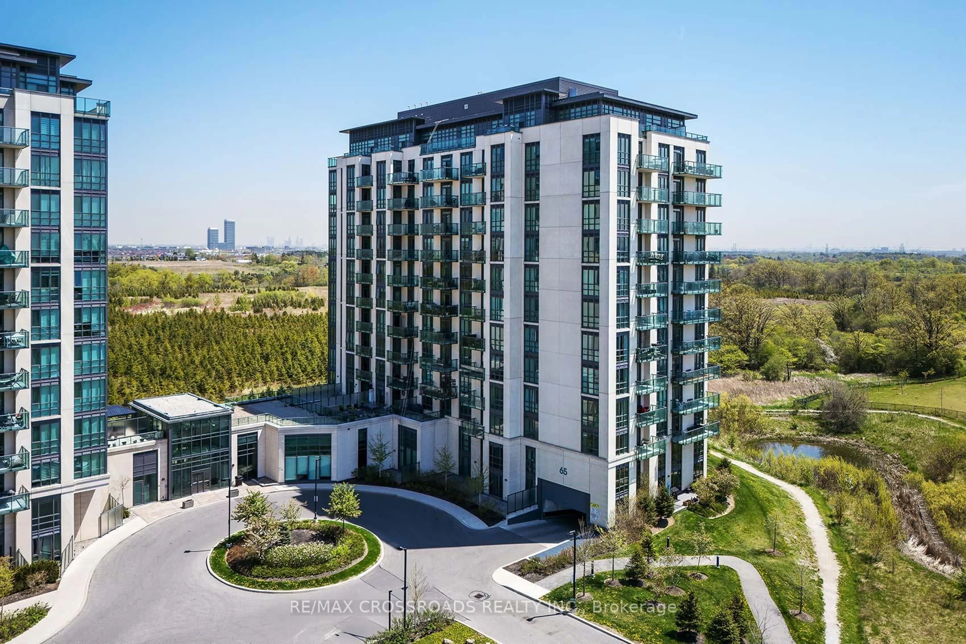 A pic from outside/outdoor area/front of a property/back of a property/a pic from drone, building for 65 Yorkland Blvd #206, Brampton Ontario L6P 4M5