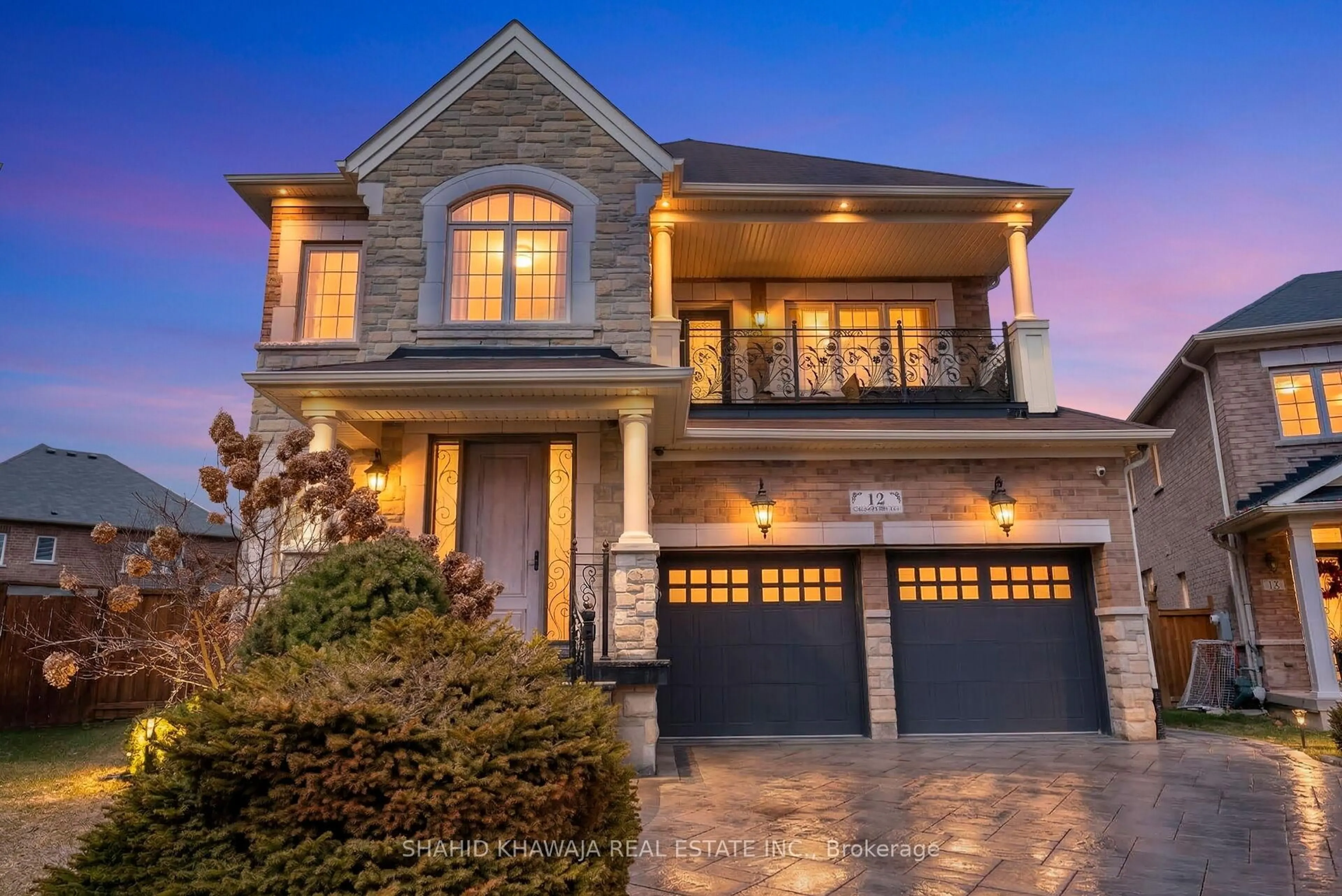 Home with brick exterior material, street for 12 Orangeblossom Tr, Brampton Ontario L6X 3B4