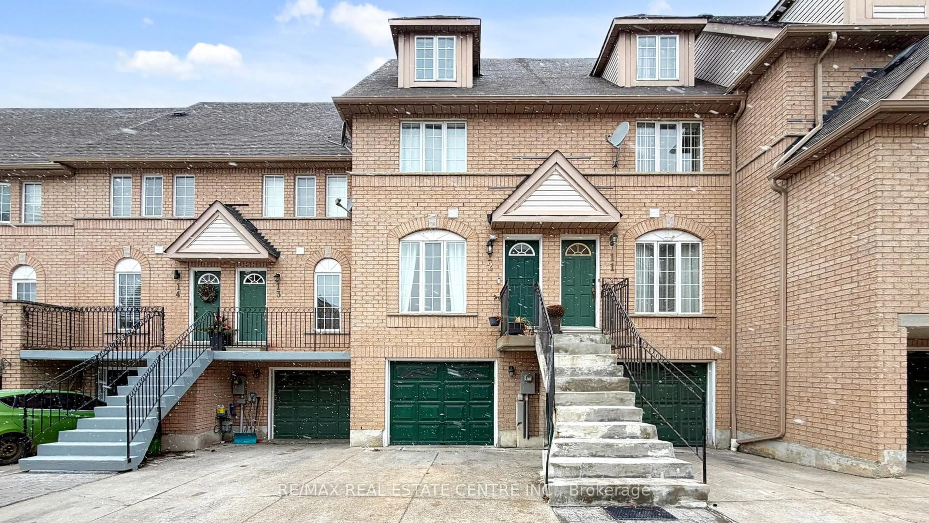 Home with brick exterior material, street for 80 Strathaven Dr #12, Mississauga Ontario L5R 3V9