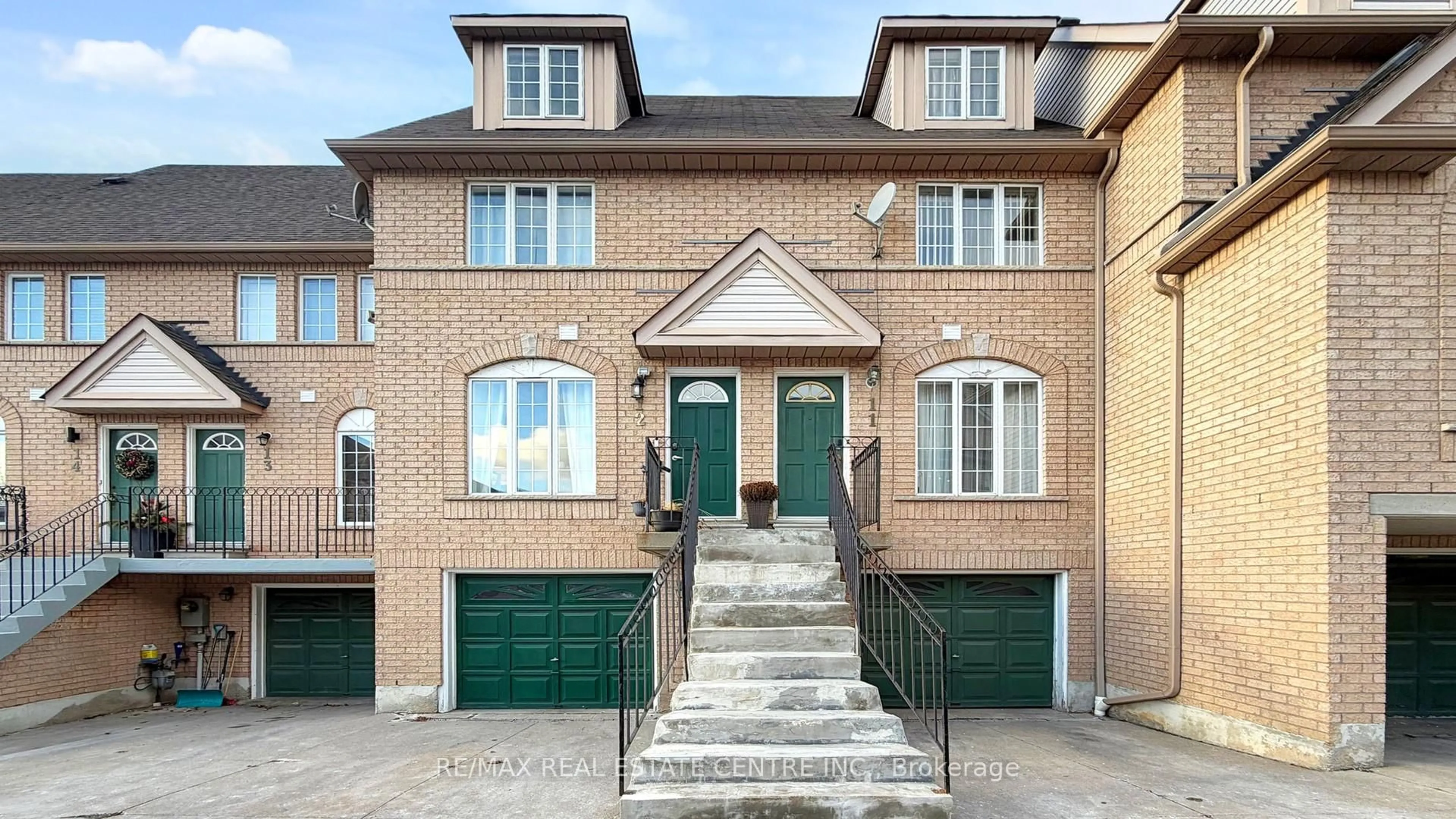 Home with brick exterior material, street for 80 Strathaven Dr #12, Mississauga Ontario L5R 3V9