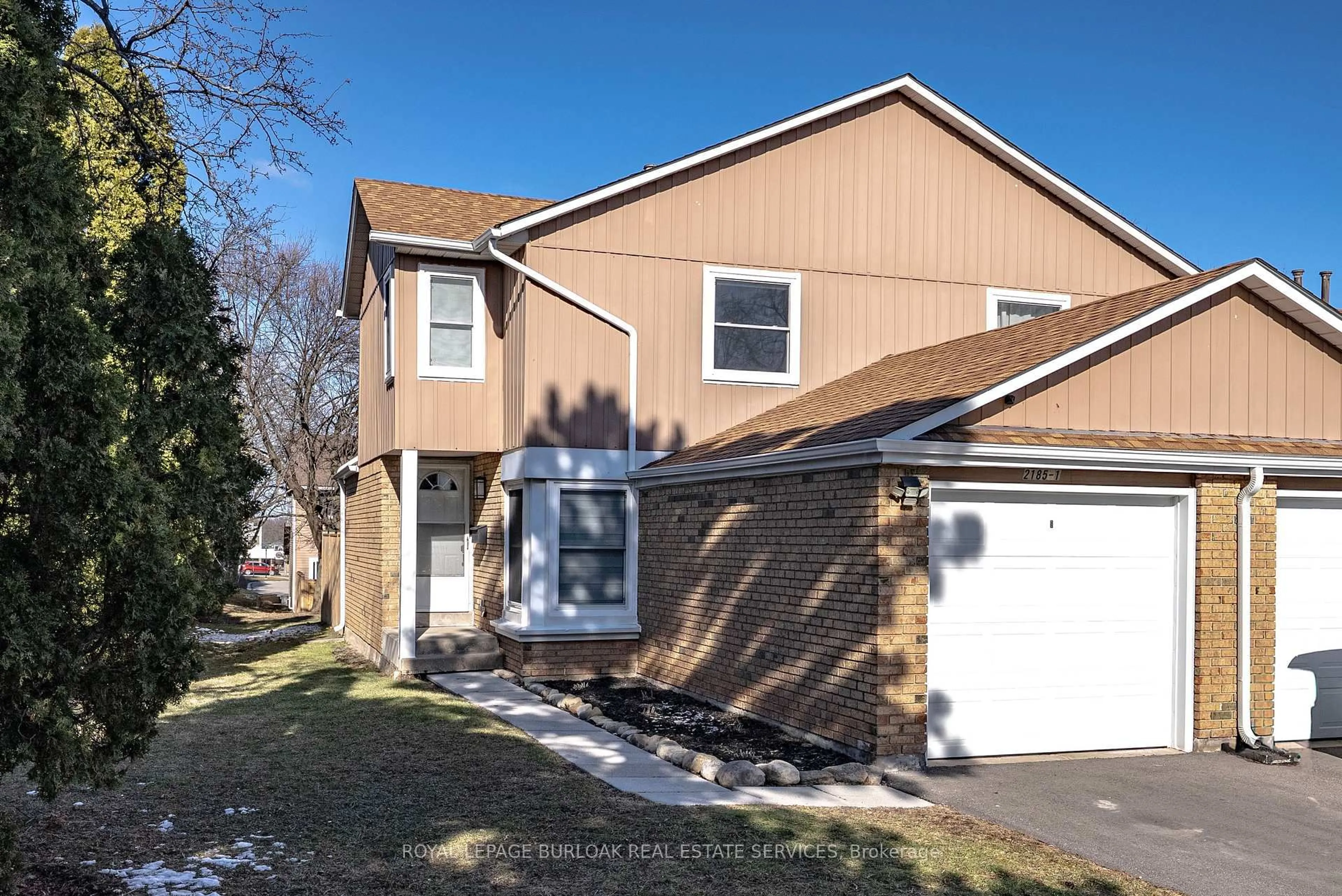 Home with vinyl exterior material, street for 2185 Fairchild Blvd #1, Burlington Ontario L7P 3P6