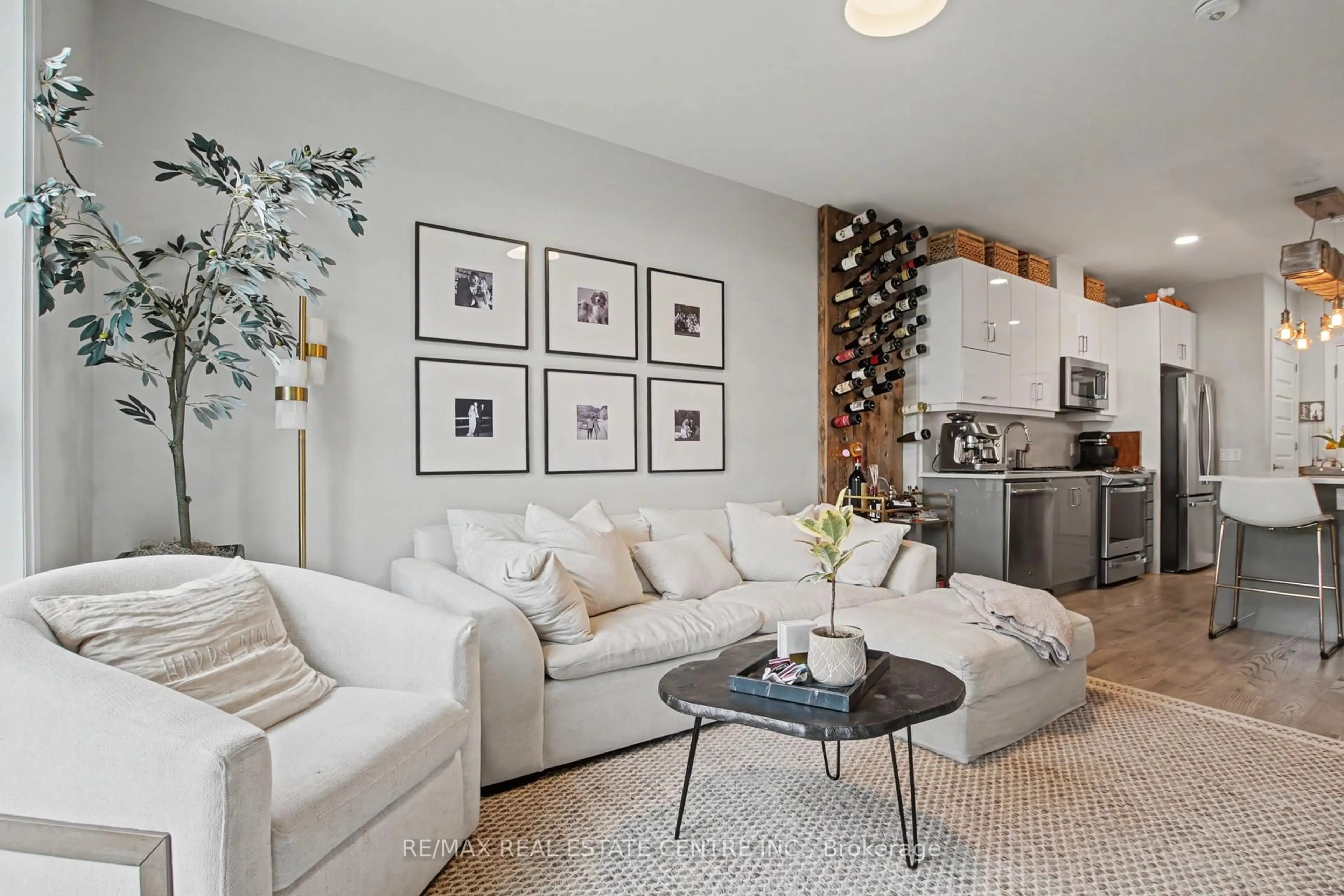 Living room with furniture, unknown for 95 Dundas St #309, Oakville Ontario L6M 5N4