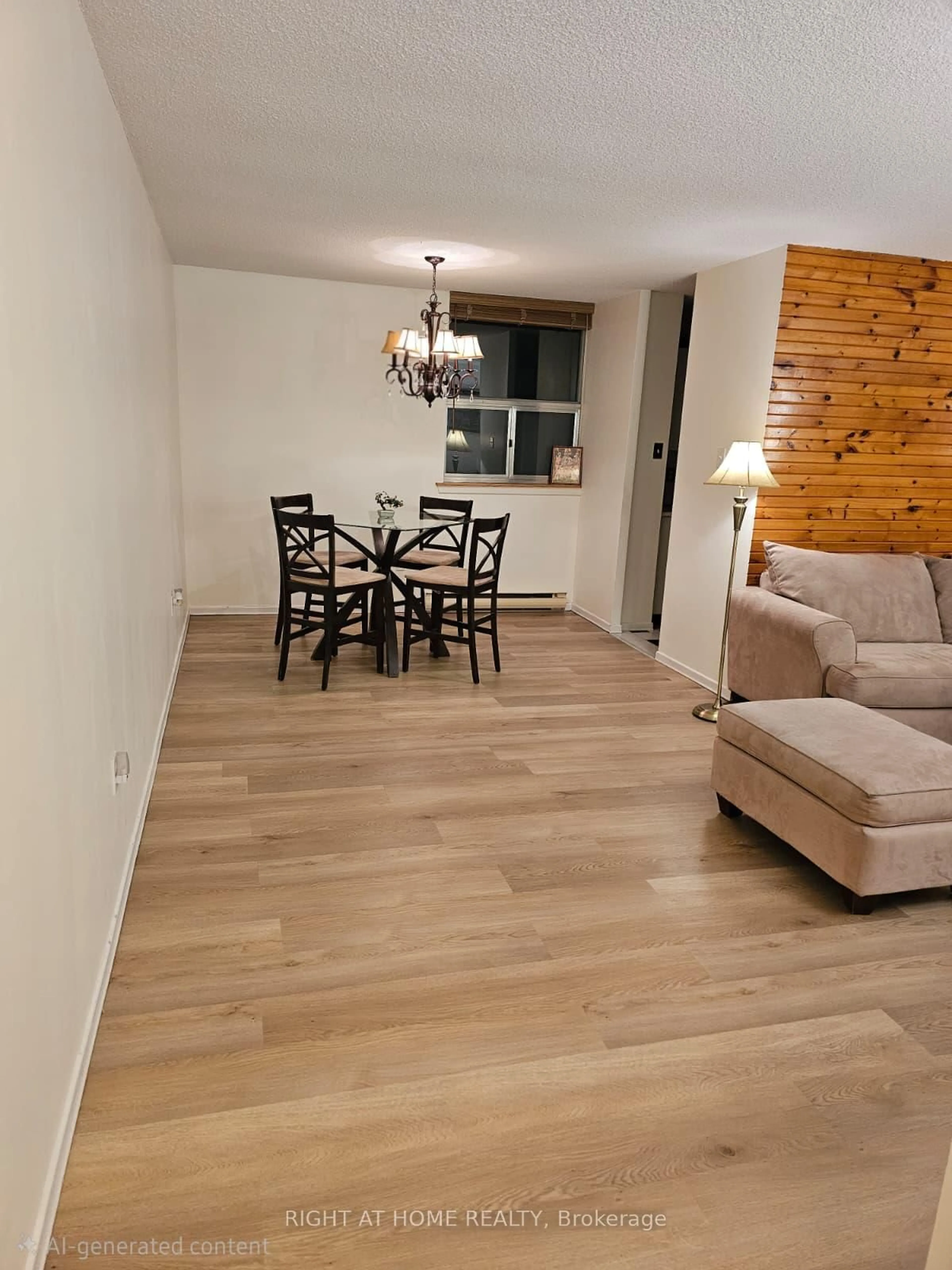 Living room with furniture, wood/laminate floor for 25 Kensington Rd #1912, Brampton Ontario L6T 3W8