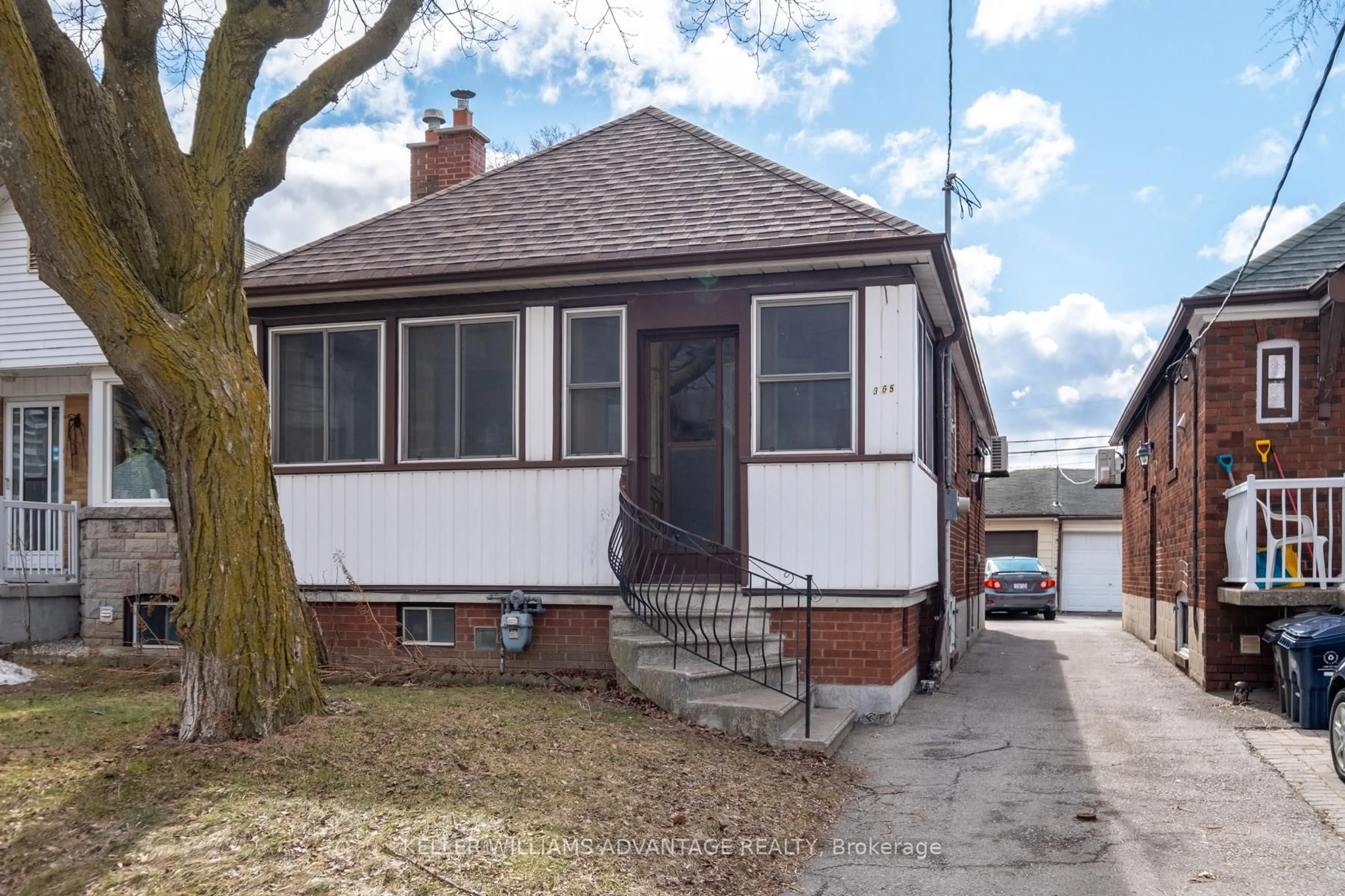 Home with vinyl exterior material, street for 365 WHITMORE Ave, Toronto Ontario M6E 2N5