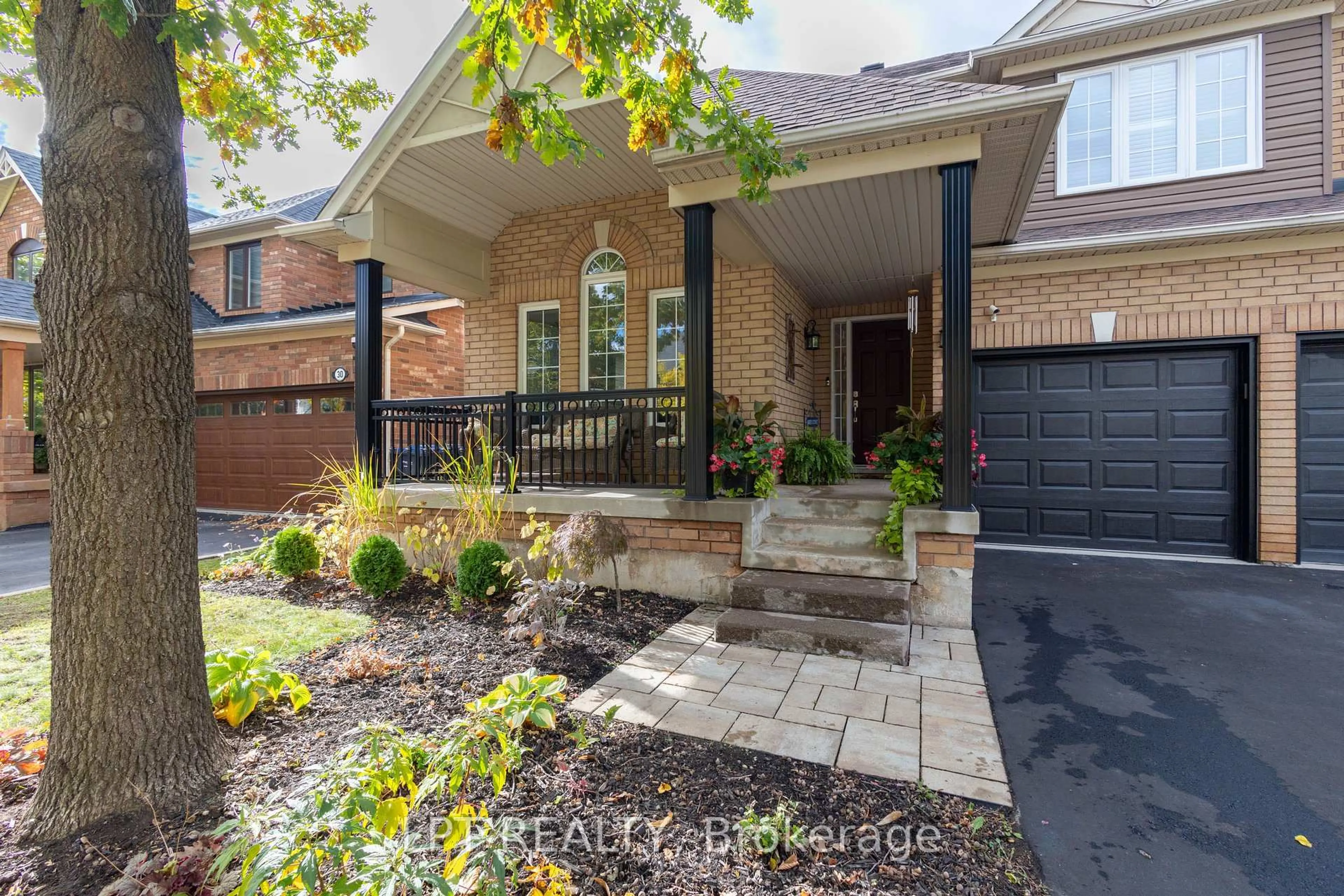Home with brick exterior material, street for 32 Fireside Dr, Brampton Ontario L7A 1P2