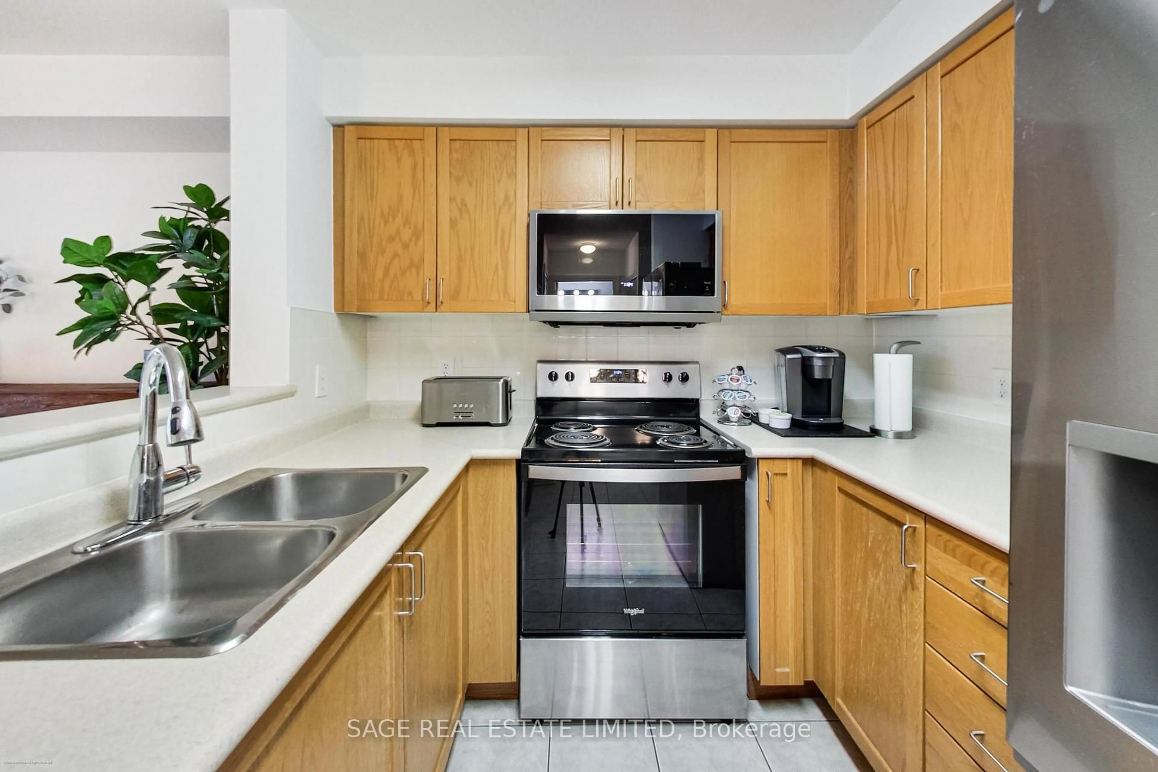Standard kitchen, ceramic/tile floor for 11 MICHAEL POWER Pl #513, Toronto Ontario M9A 5G3