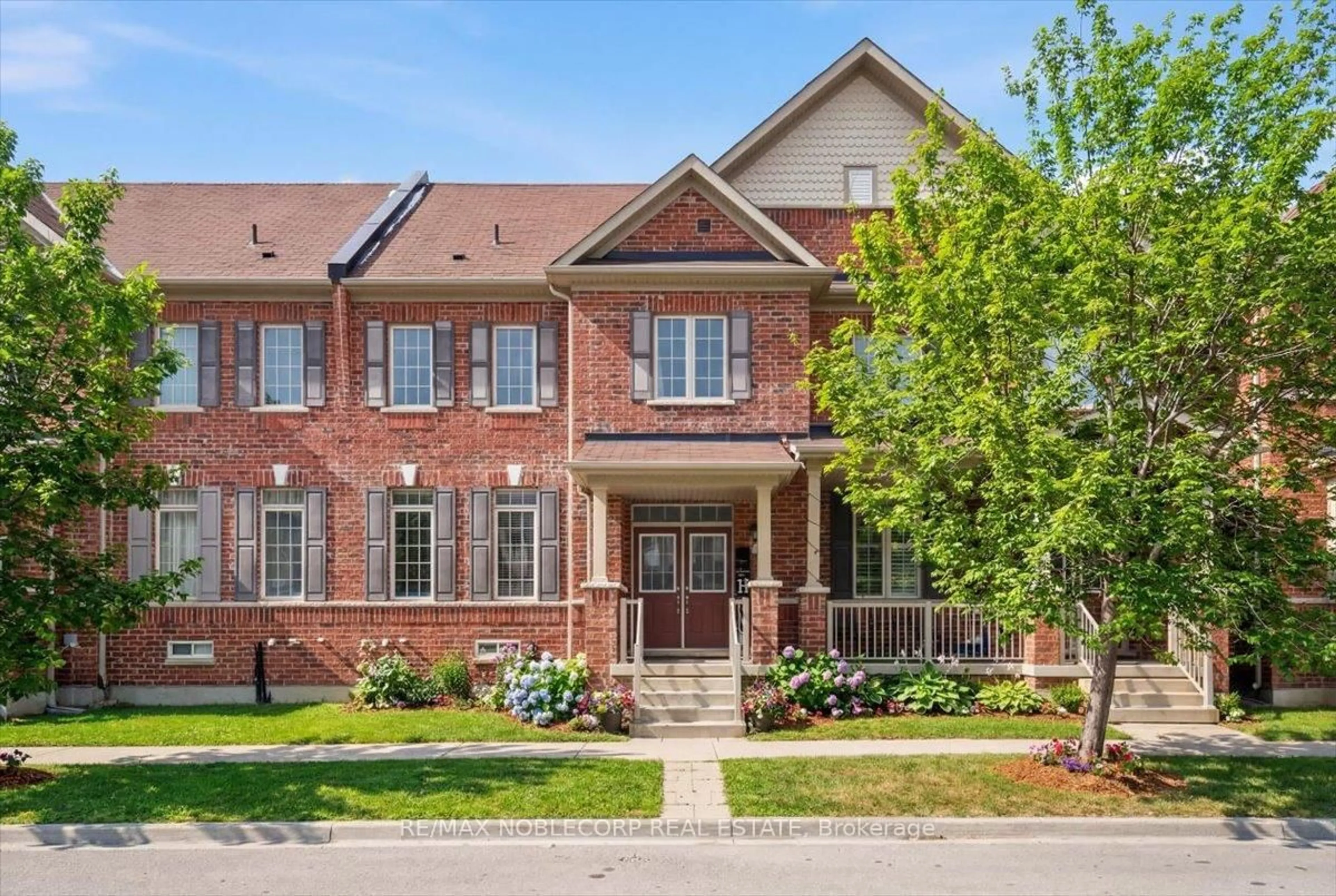Home with brick exterior material, street for 24 Primo Rd, Brampton Ontario L7A 3Y1
