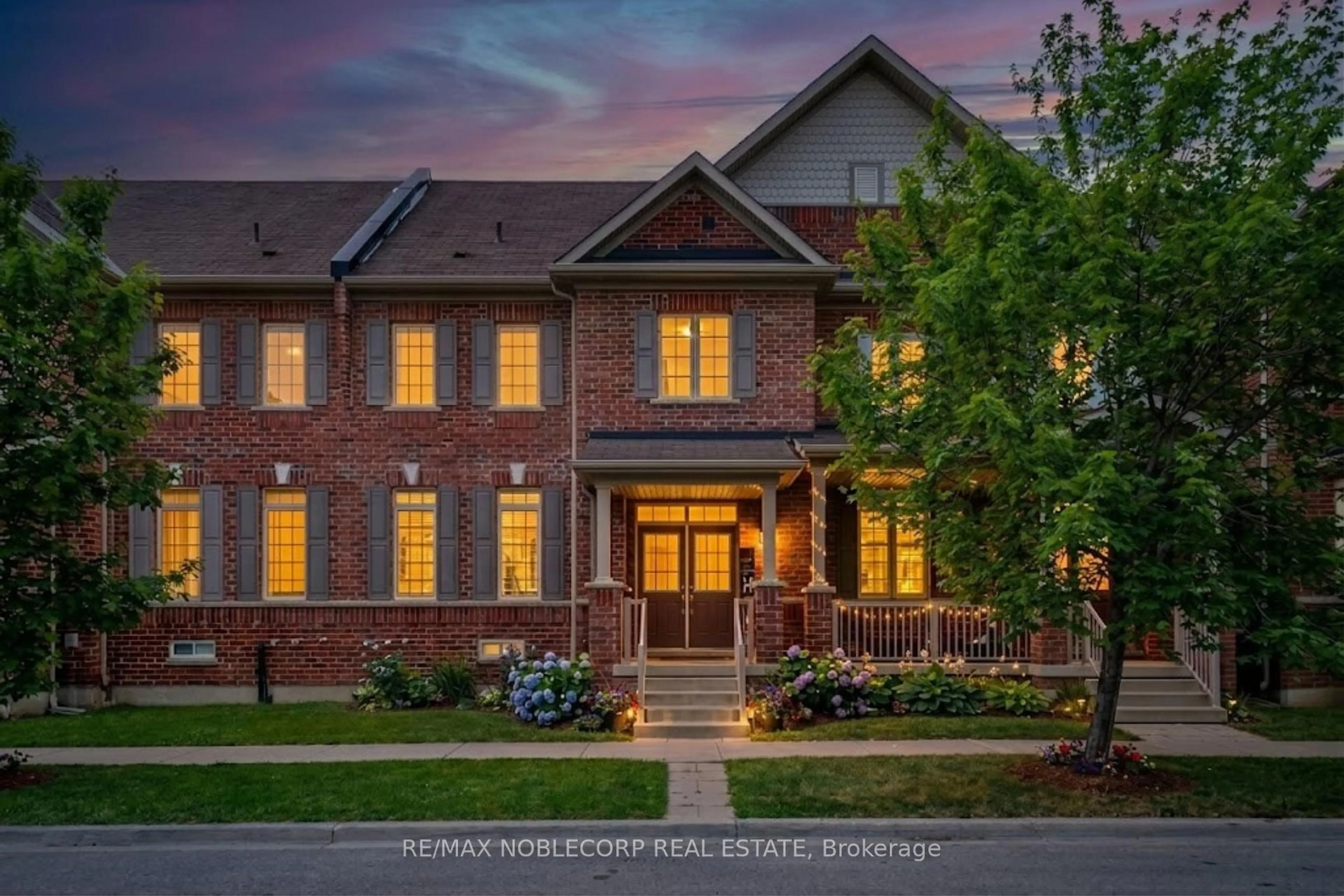 Home with brick exterior material, street for 24 Primo Rd, Brampton Ontario L7A 3Y1