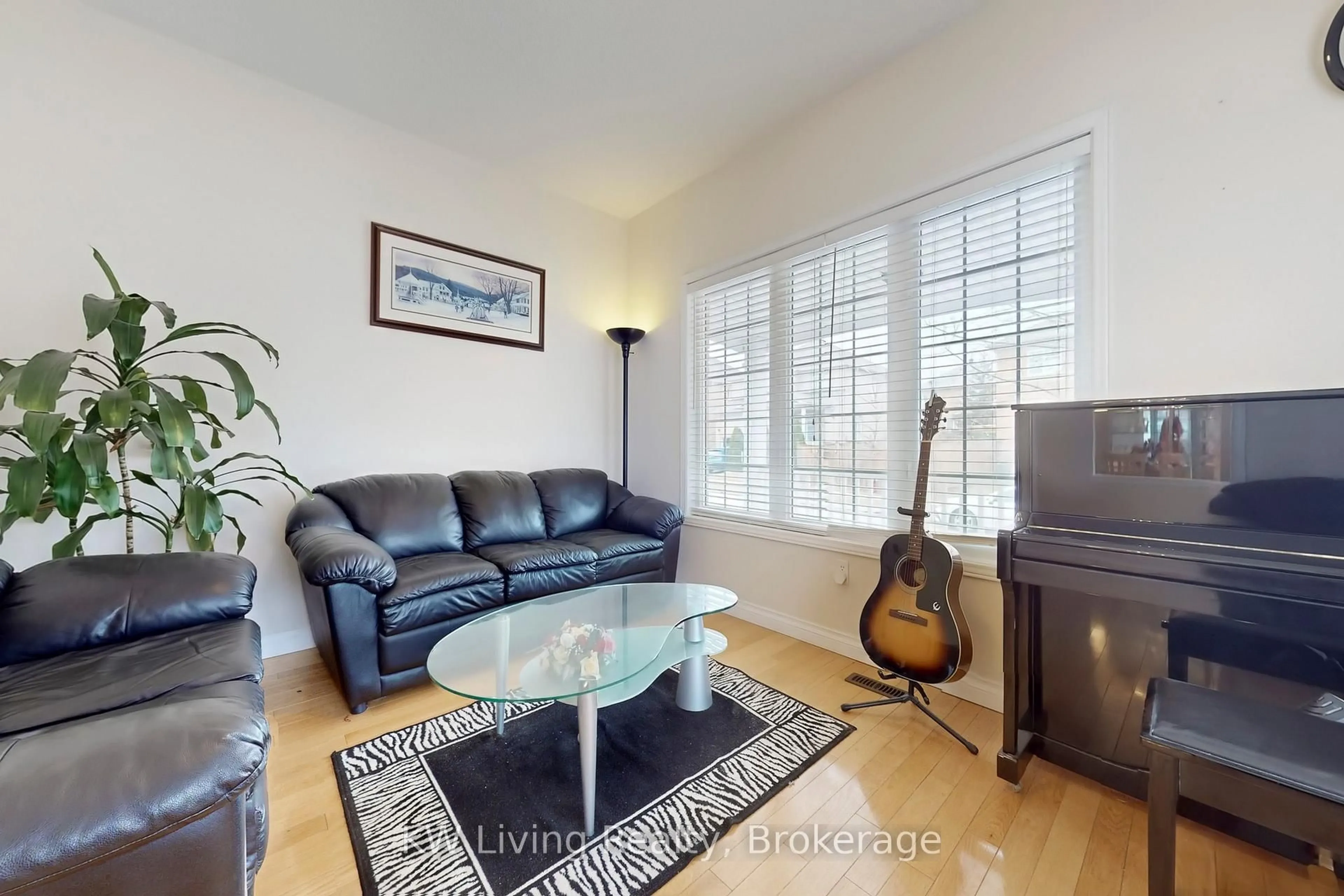 Living room with furniture, wood/laminate floor for 5430 Churchill Meadows Blvd, Mississauga Ontario L5M 6X5