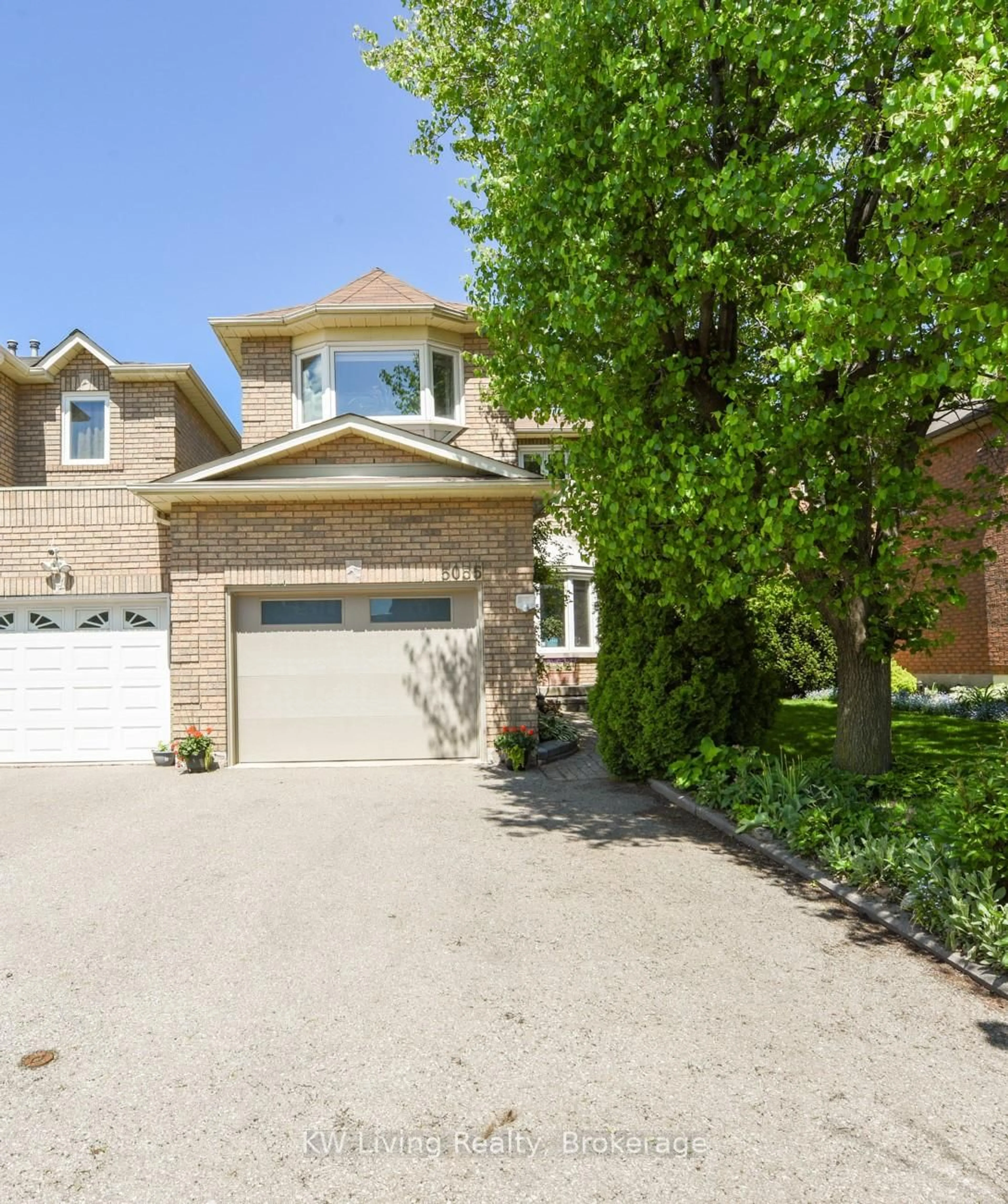 Home with brick exterior material, street for 5055 Moulin Rouge Cres, Mississauga Ontario L5V 1R5