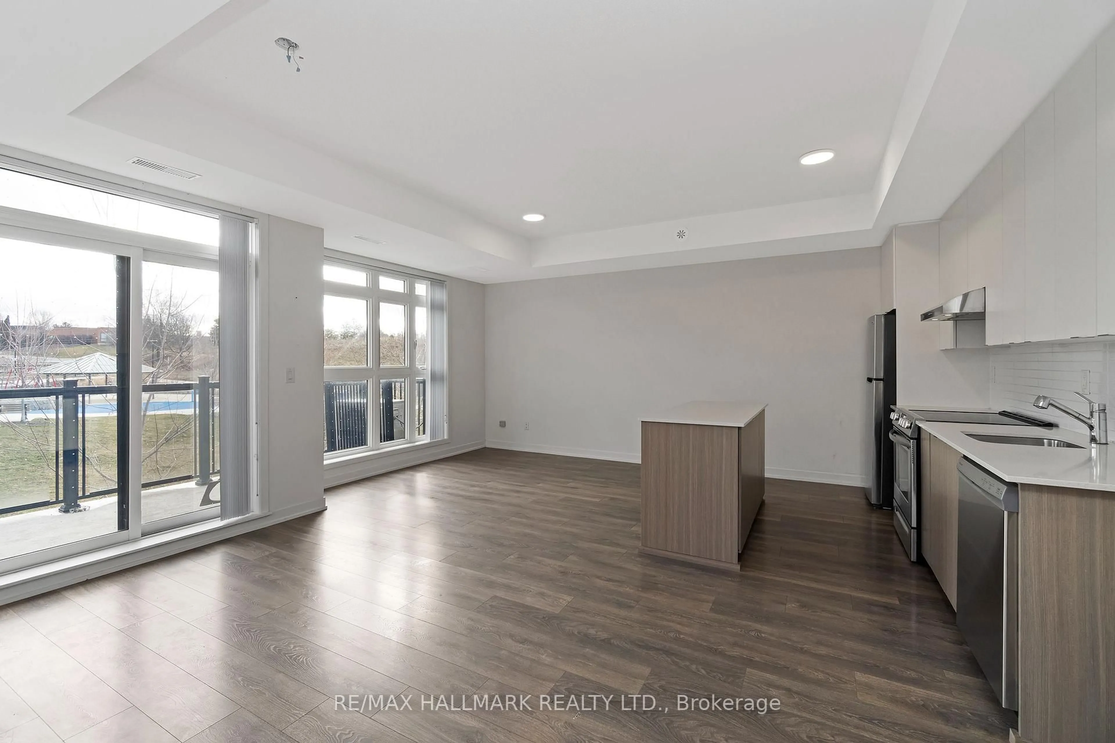 Open concept kitchen, unknown for 90 Canon Jackson Dr #H202, Toronto Ontario M6M 0B9