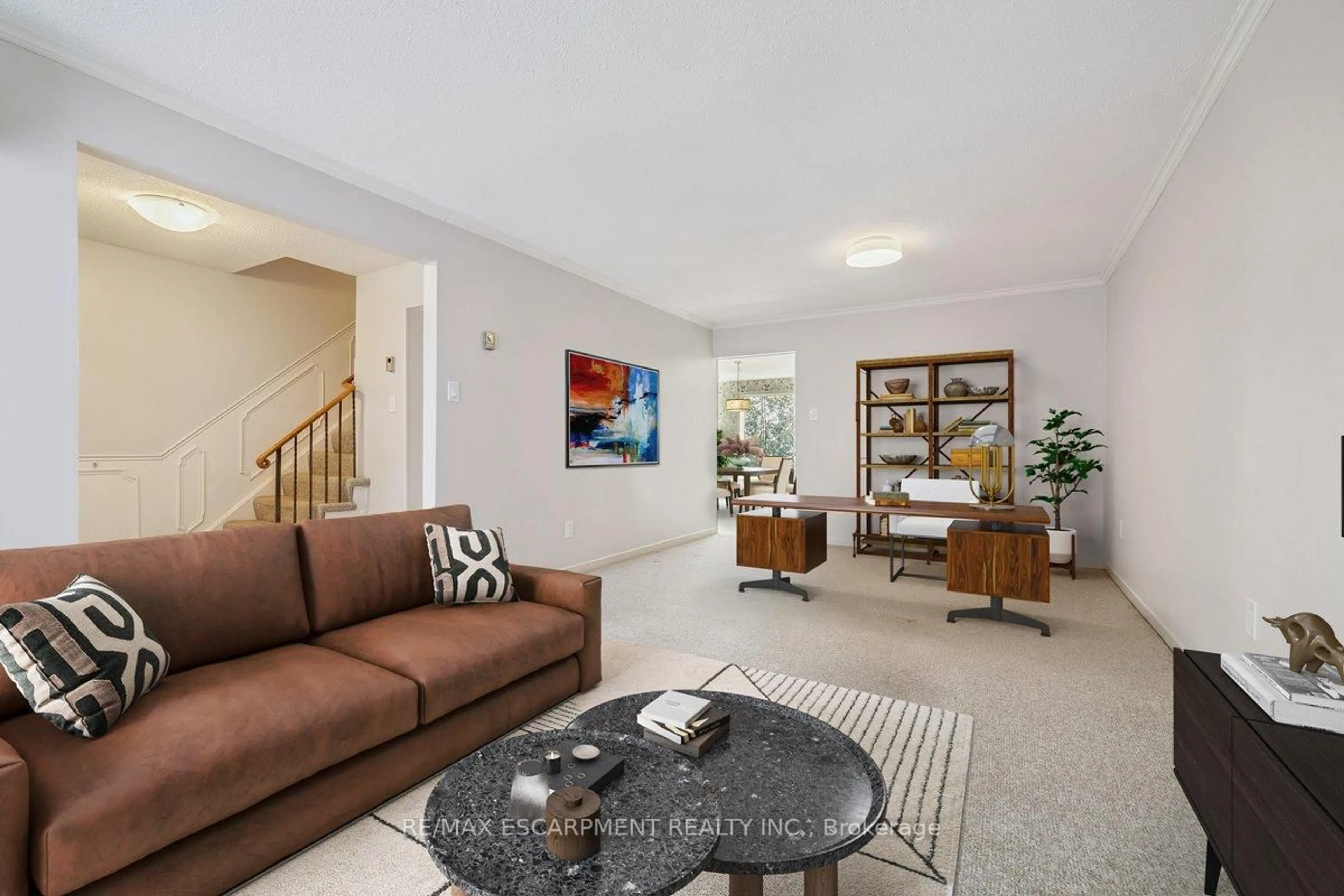 Living room with furniture, unknown for 1552 Kerns Rd #4, Burlington Ontario L7P 3A7