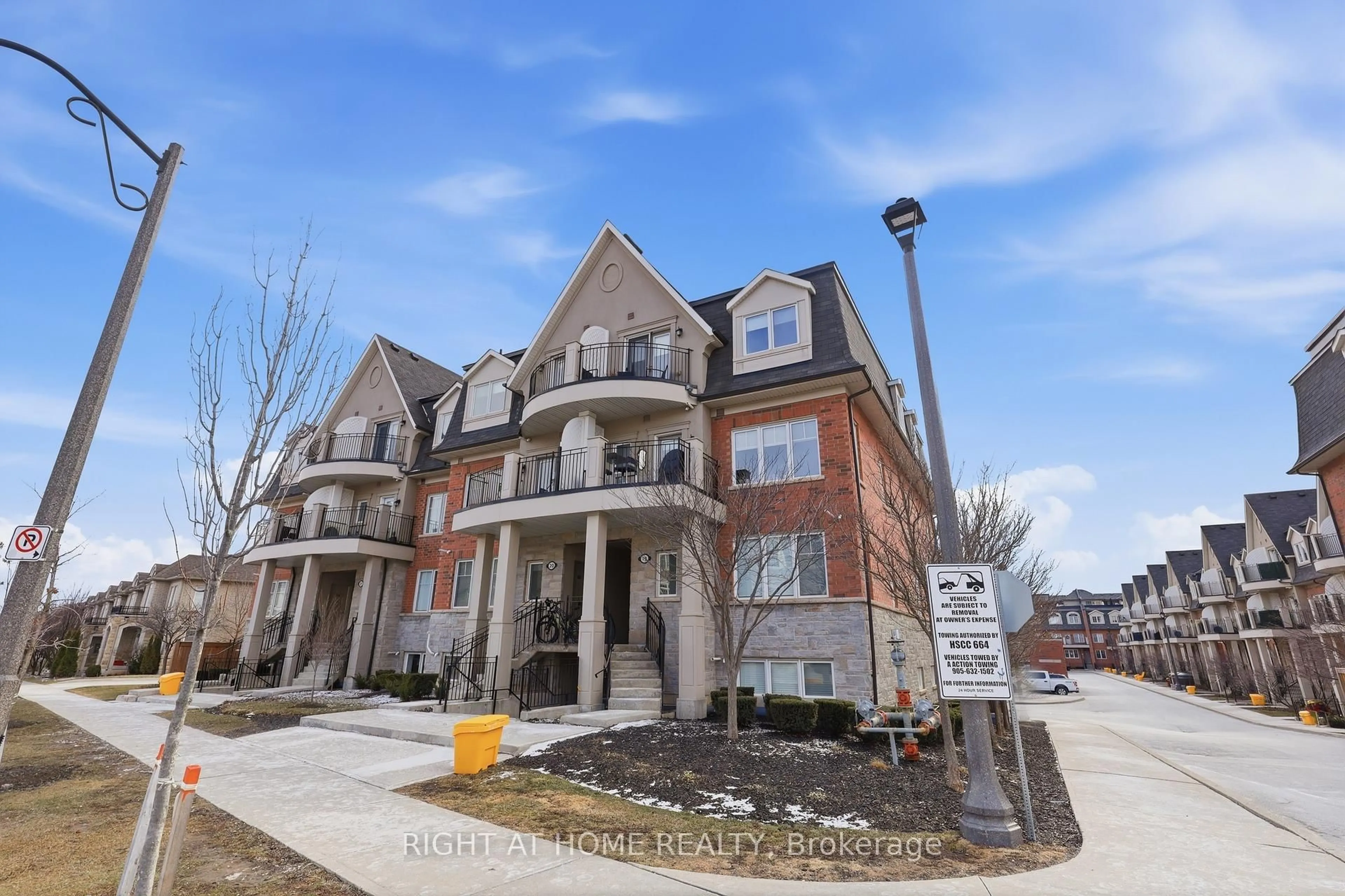 Home with brick exterior material, street for 2420 Baronwood Dr #20-04, Oakville Ontario L6M 0X6