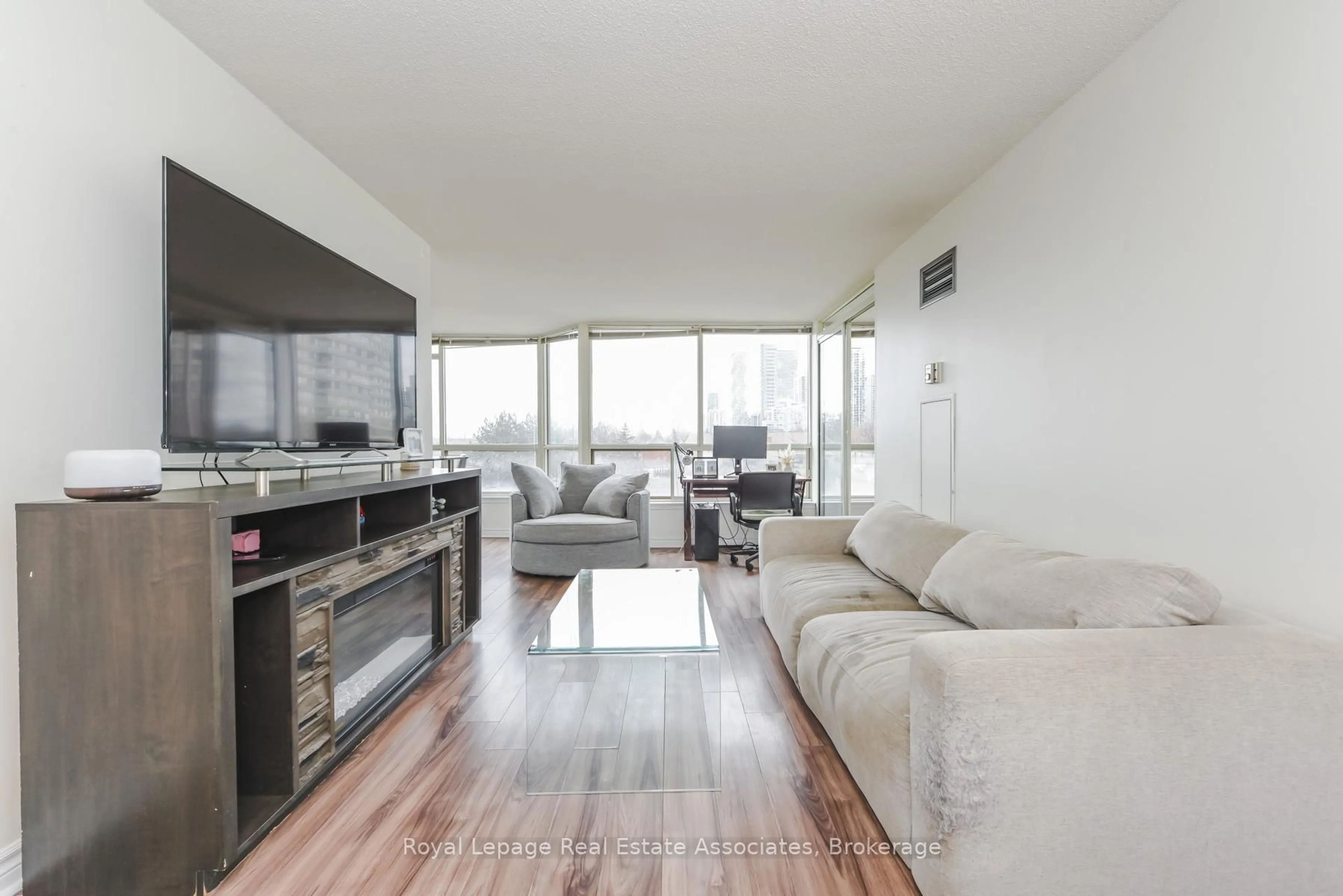 Living room with furniture, unknown for 55 Elm Dr #501, Mississauga Ontario L5B 3Z3