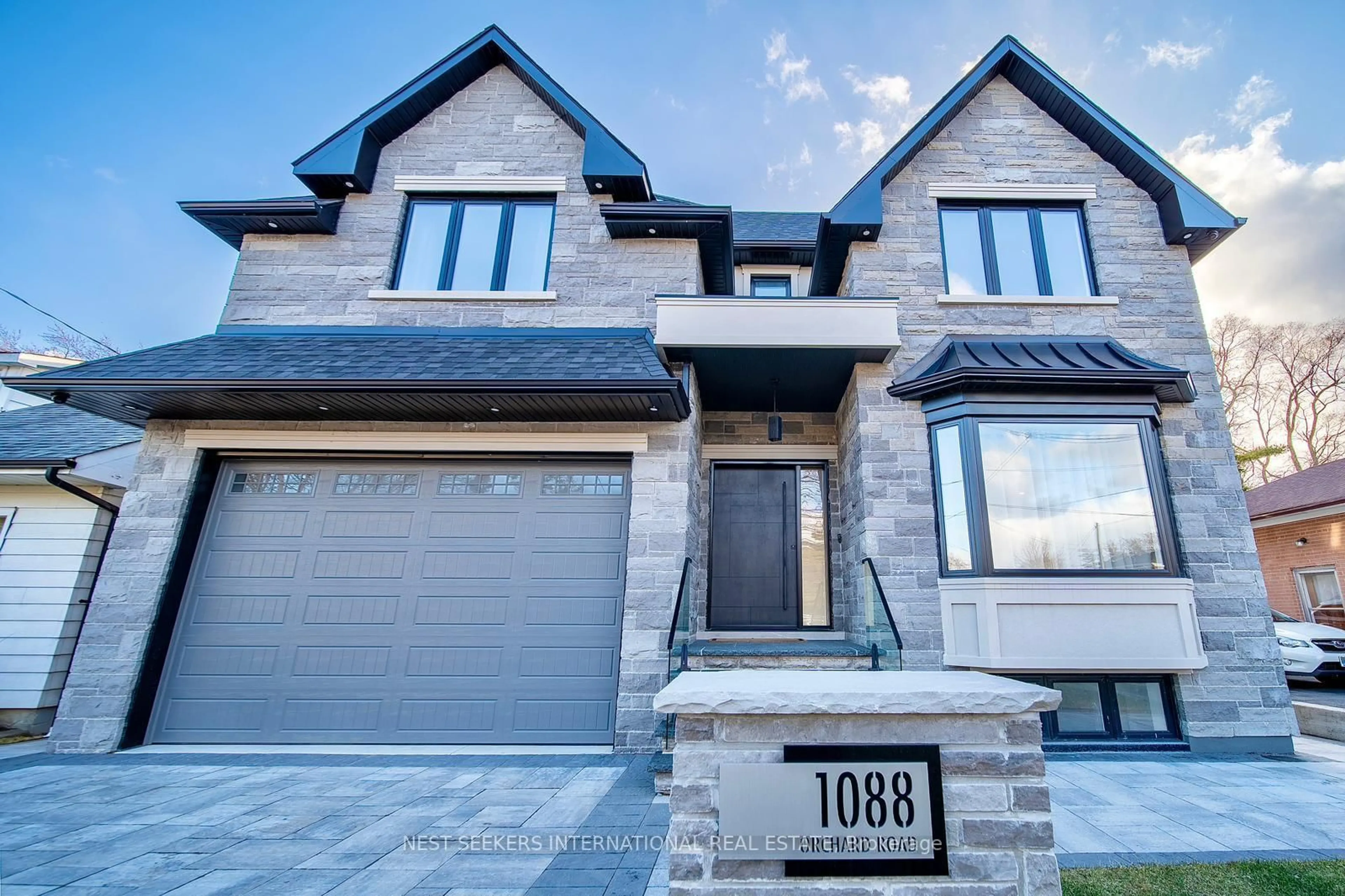 Home with brick exterior material, street for 1088 Orchard Rd, Mississauga Ontario L5E 2N9