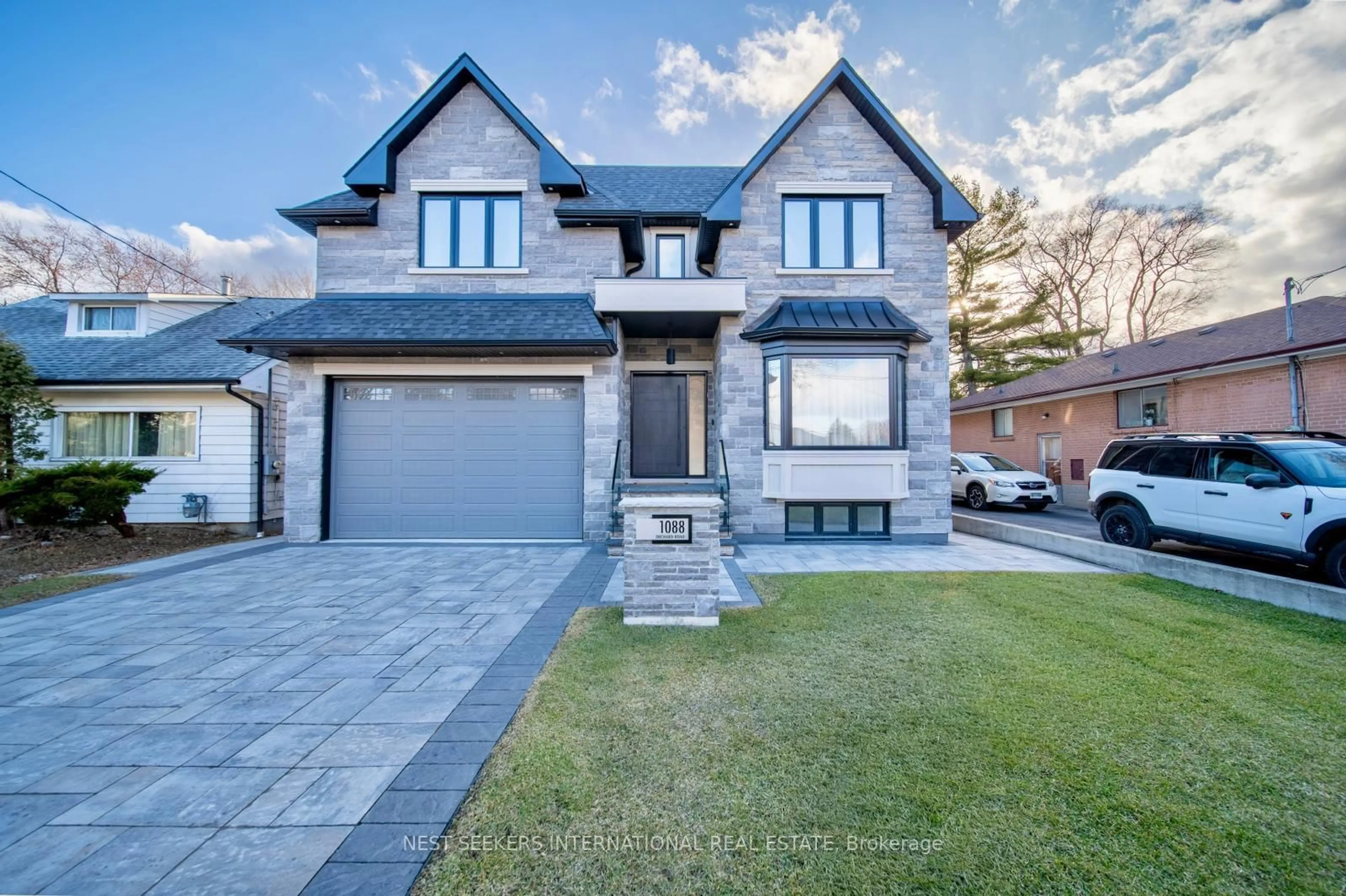Home with brick exterior material, street for 1088 Orchard Rd, Mississauga Ontario L5E 2N9