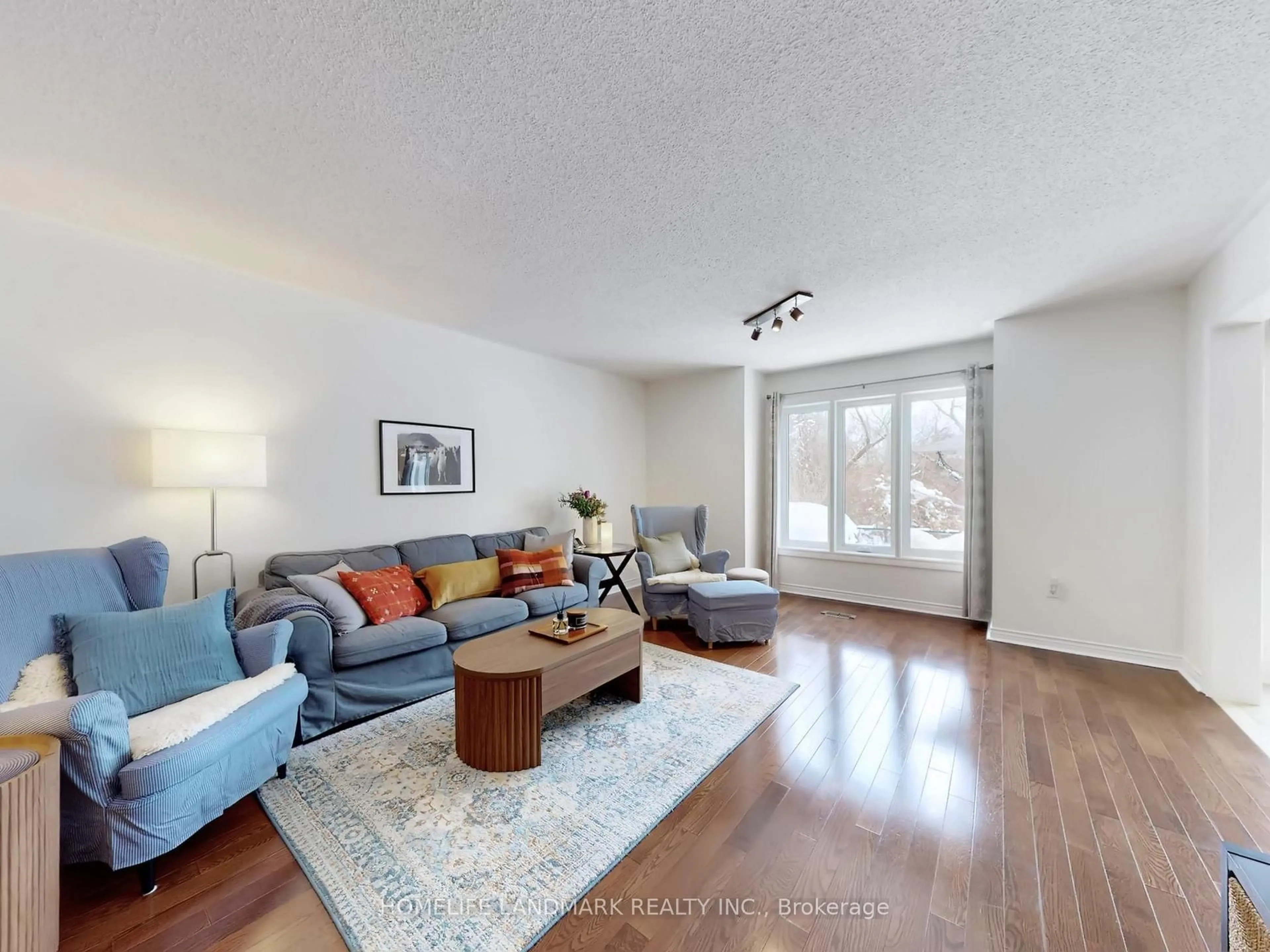 Living room with furniture, unknown for 156 Pressed Brick Dr, Brampton Ontario L6V 4K6