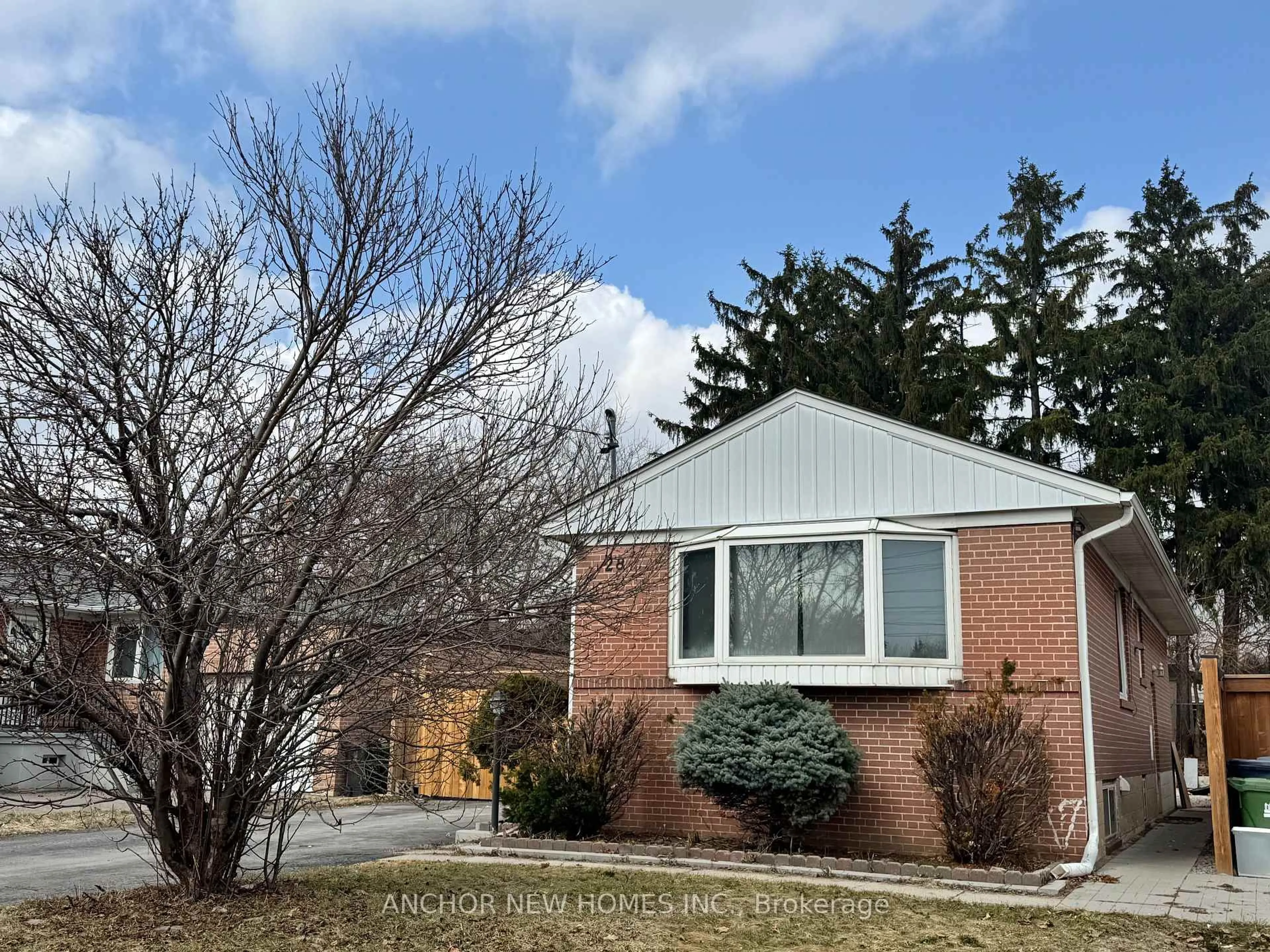 Home with brick exterior material, street for 28 Eringate Dr, Toronto Ontario M9C 3Y7
