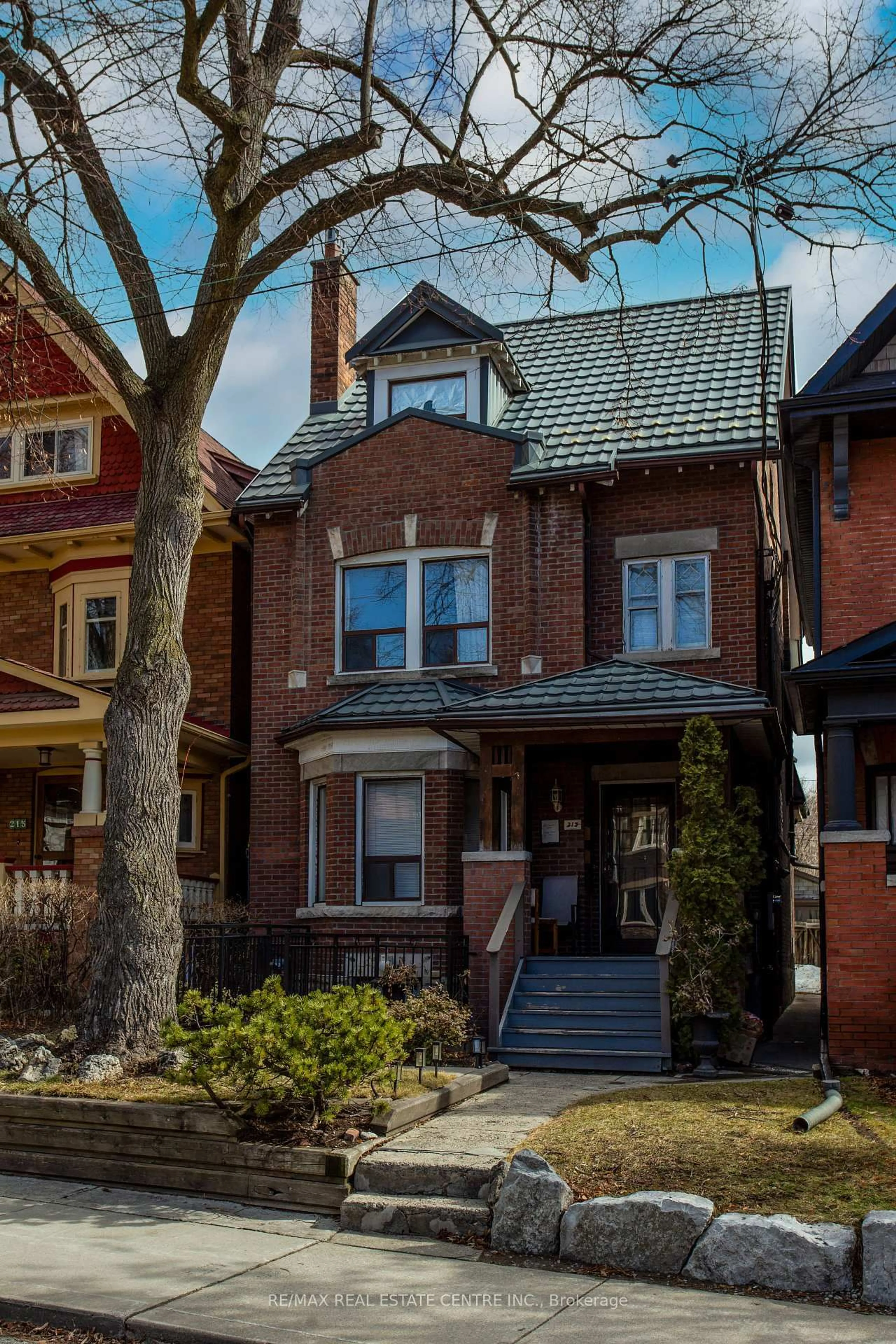 Home with brick exterior material, street for 213 Indian Rd, Toronto Ontario M6R 2W7