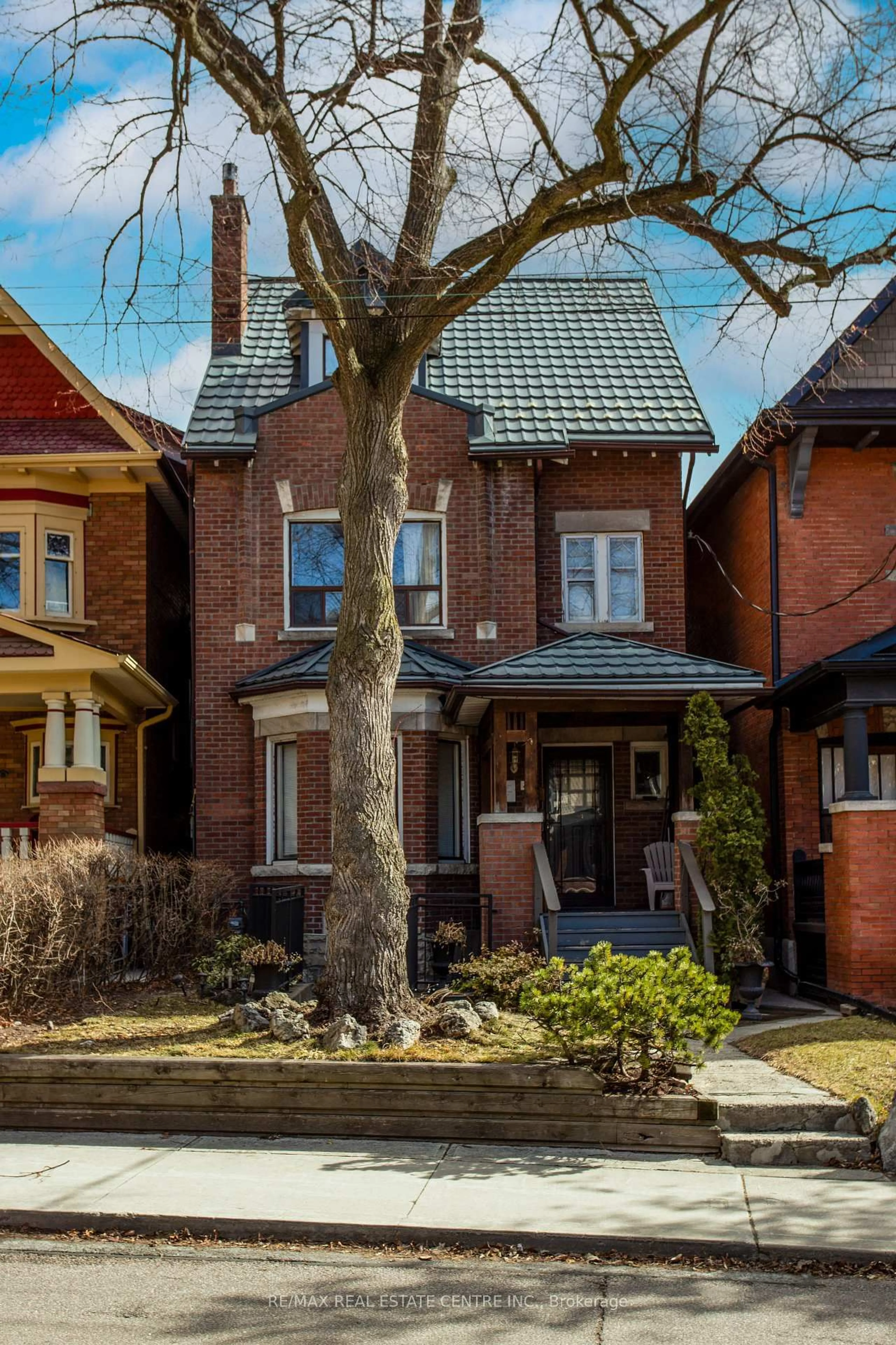 Home with brick exterior material, street for 213 Indian Rd, Toronto Ontario M6R 2W7