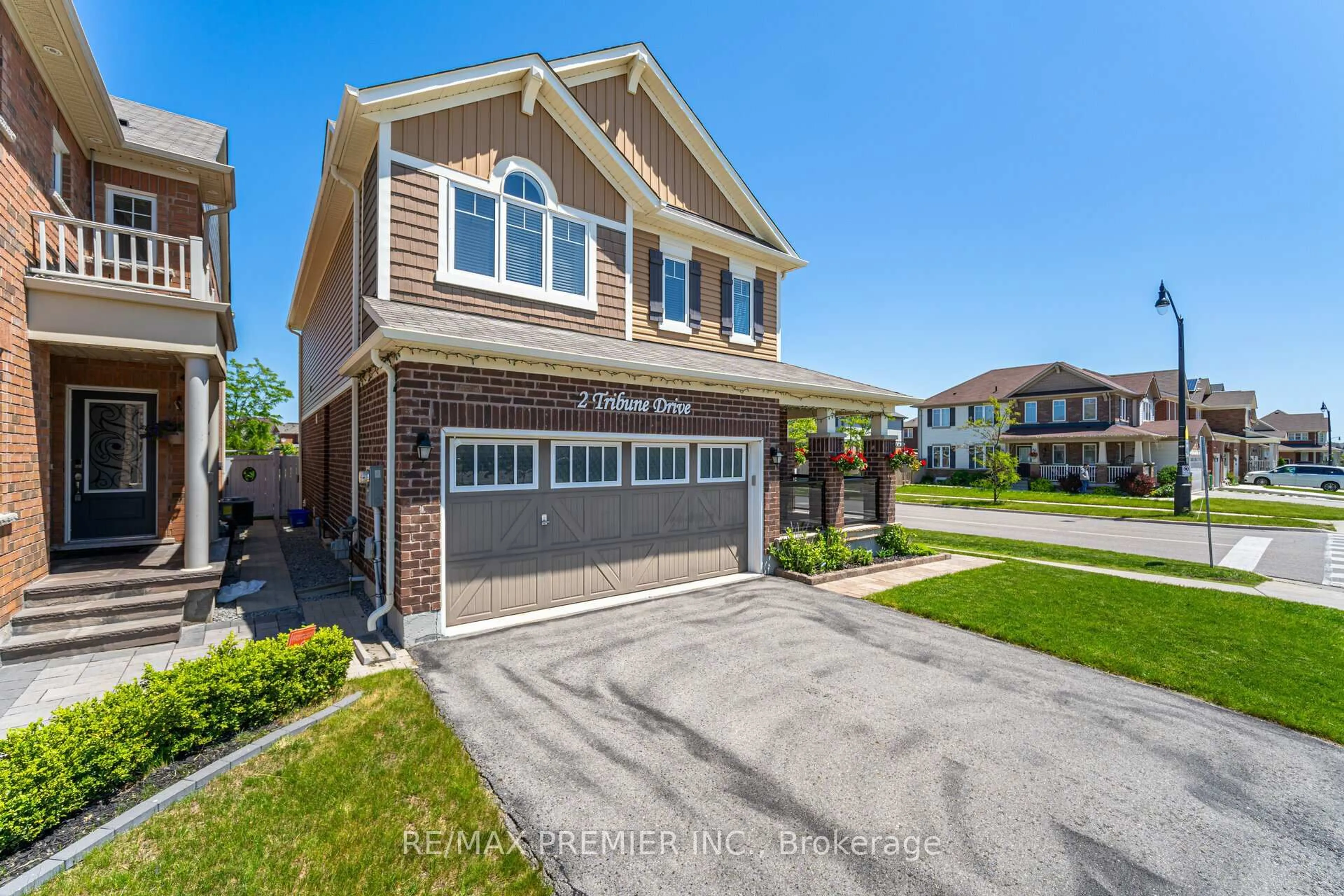 Home with brick exterior material, street for 2 Tribune Dr, Brampton Ontario L7A 0X5