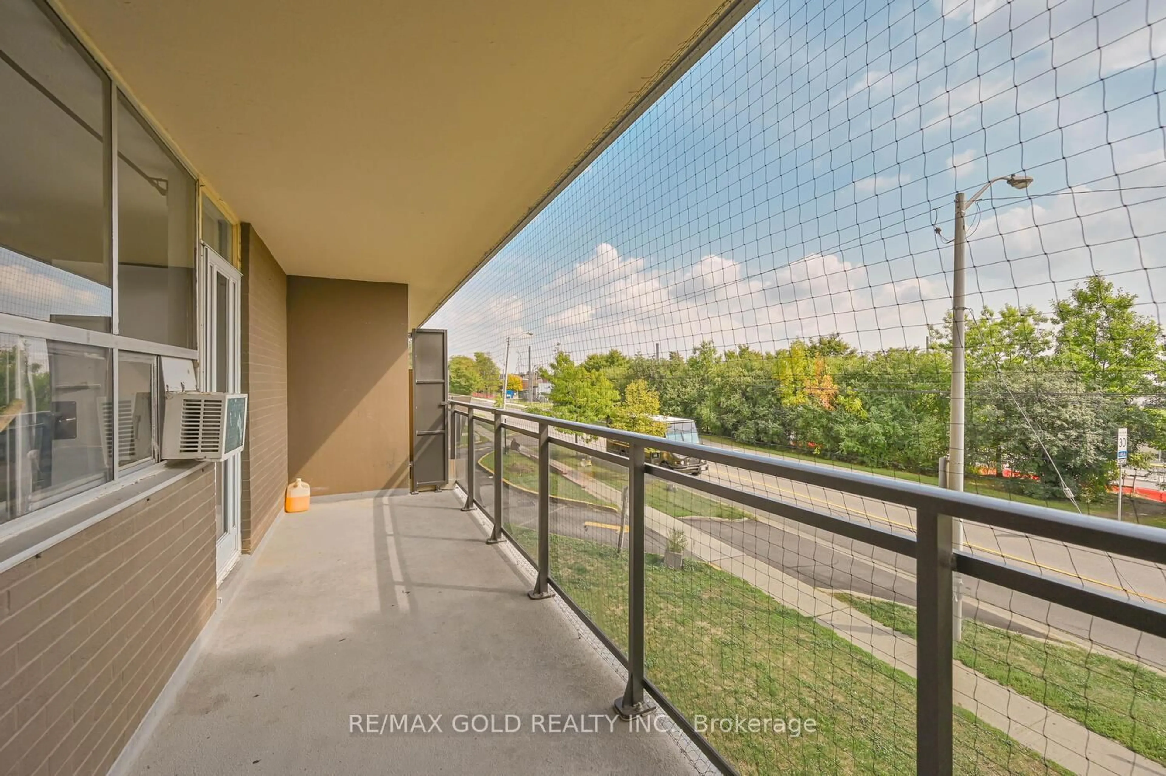 Balcony in the apartment, city buildings view from balcony for 60 Stevenson Rd #207, Toronto Ontario M9V 2B4