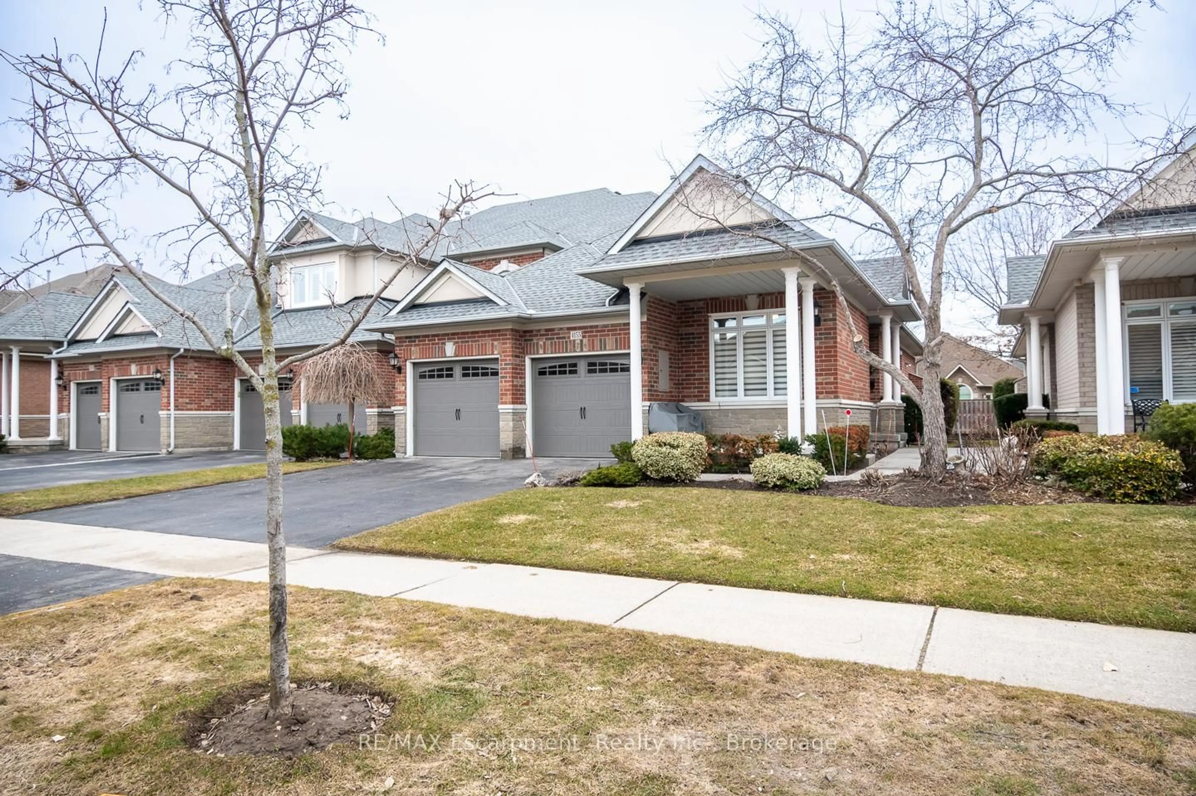 Home with brick exterior material, street for 4155 Stonebridge Cres, Burlington Ontario L7M 4N2