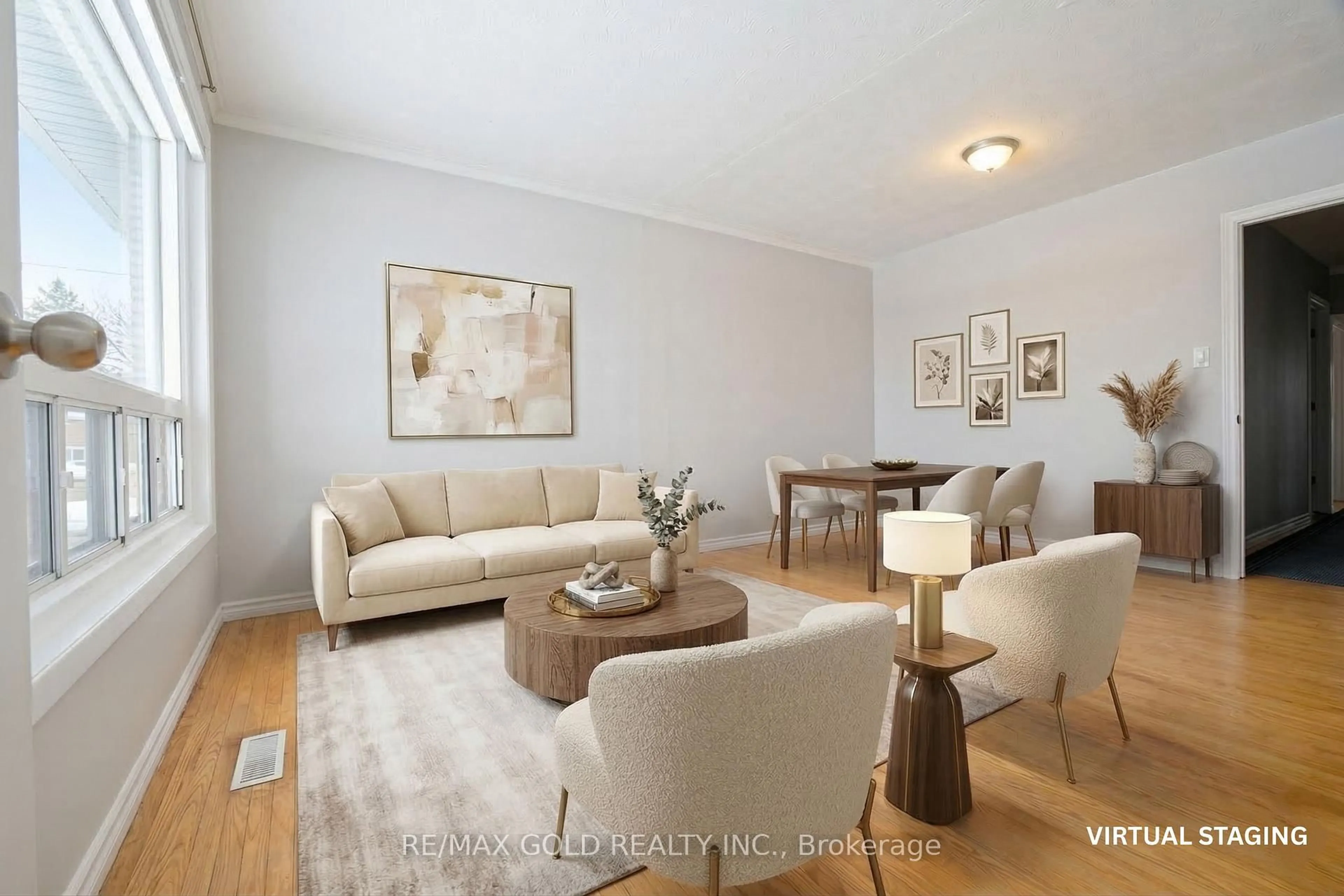 Living room with furniture, wood/laminate floor for 130 Duncanwoods Dr, Toronto Ontario M9L 2E1