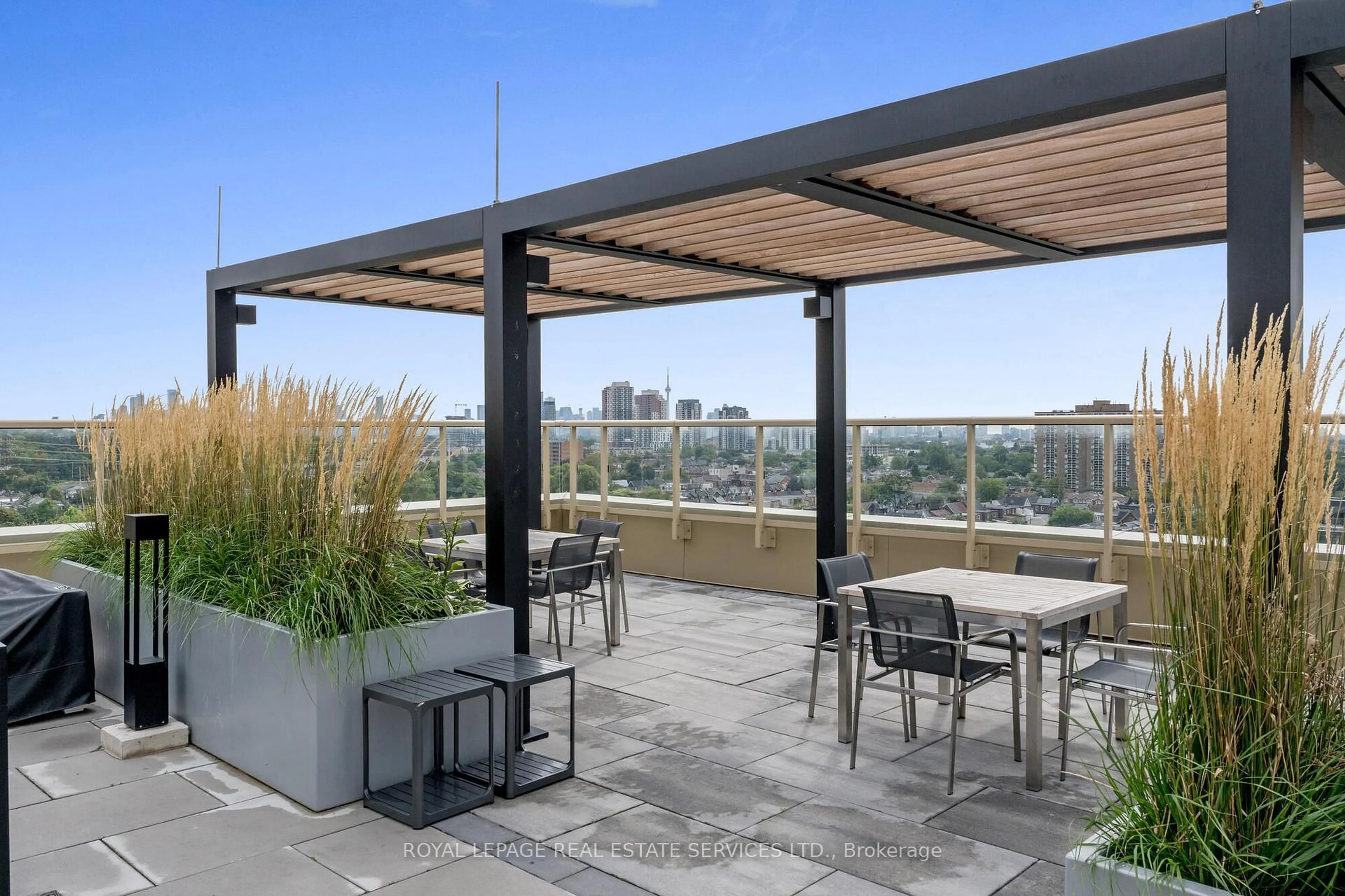 Patio, city buildings view from balcony for 1787 St Clair Ave #621, Toronto Ontario M6N 1J6