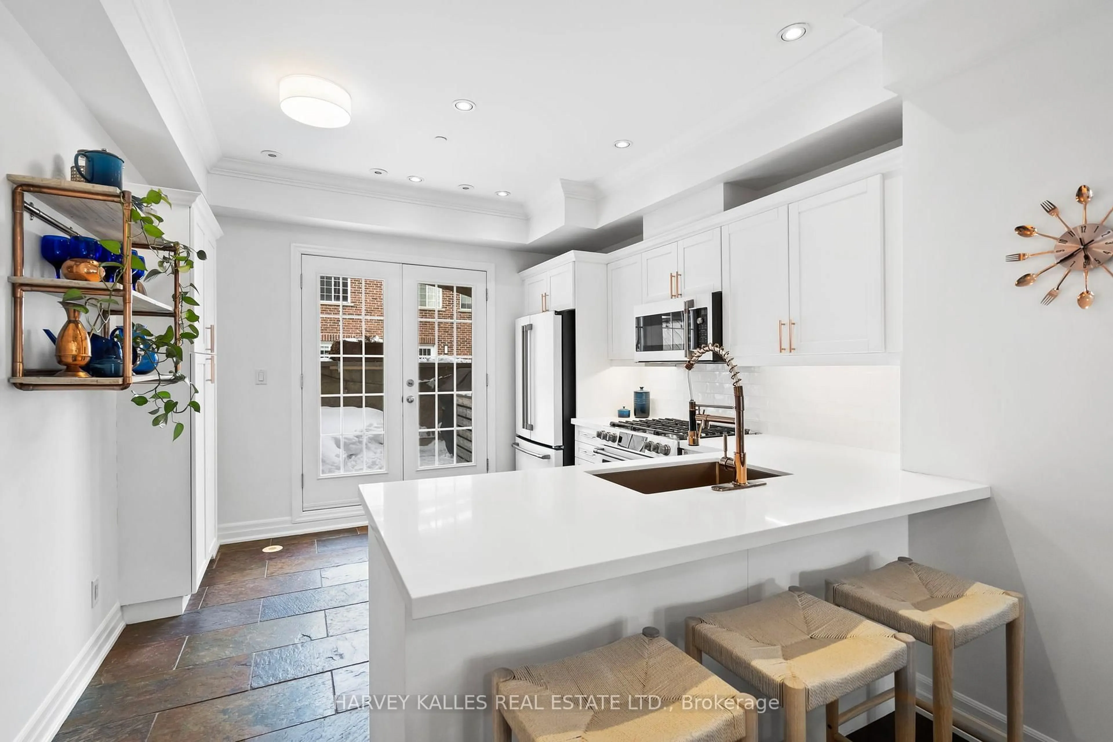 Open concept kitchen, ceramic/tile floor for 17 Peelar Mews, Toronto Ontario M8Y 0B1