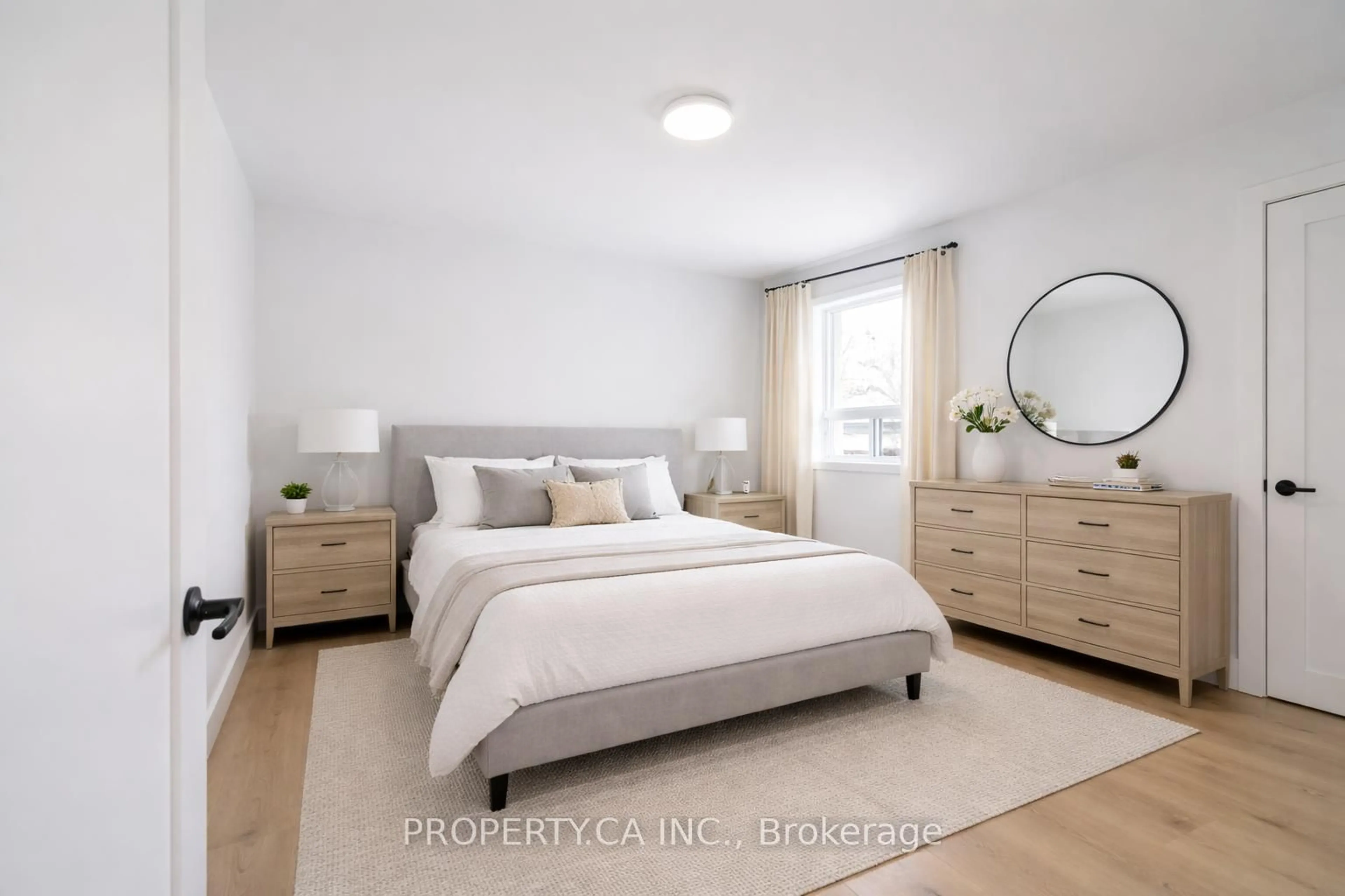 Bedroom with bed, wood/laminate floor for 46 McMurchy Ave, Brampton Ontario L6X 1Y1