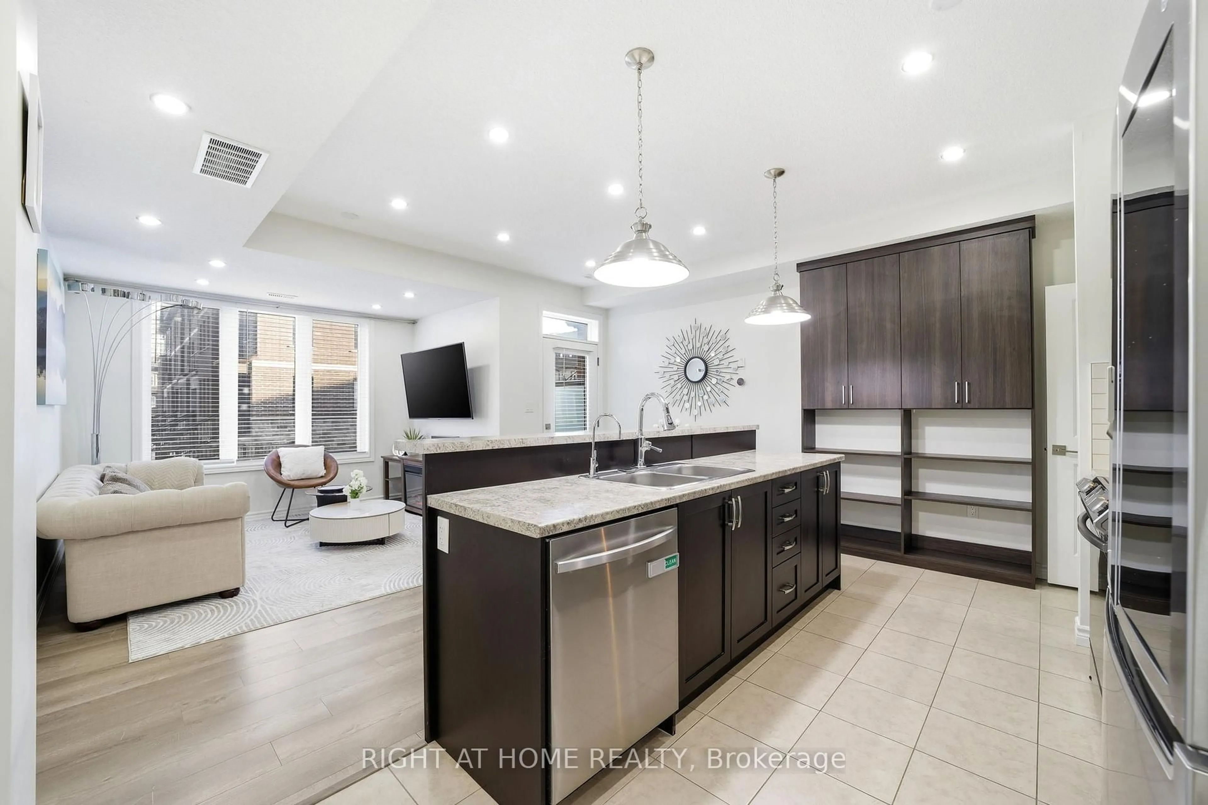 Open concept kitchen, ceramic/tile floor for 445 Ontario St #128, Milton Ontario L9T 9K4