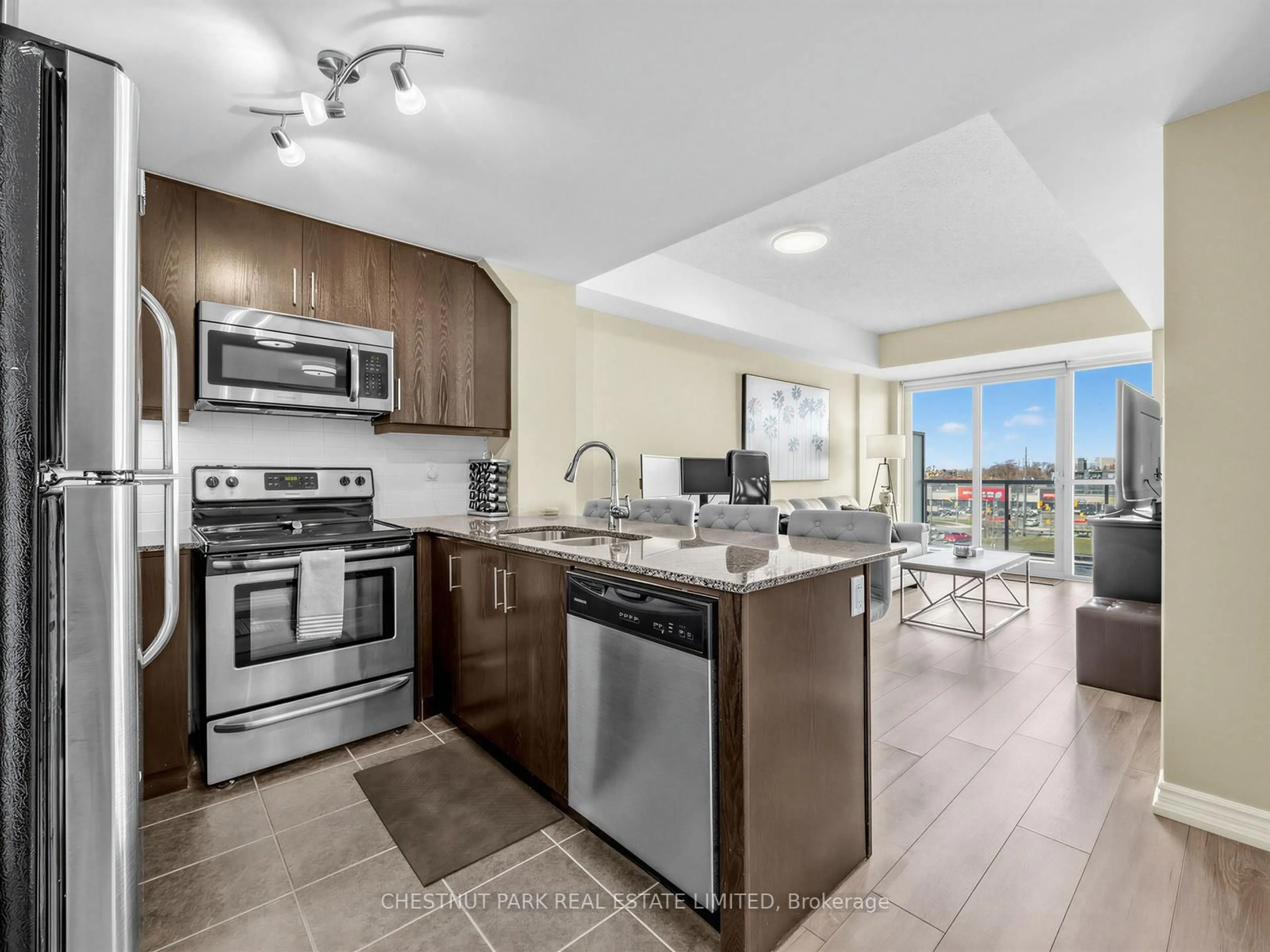Open concept kitchen, unknown for 15 James Finlay Way #613, Toronto Ontario M3M 0B3
