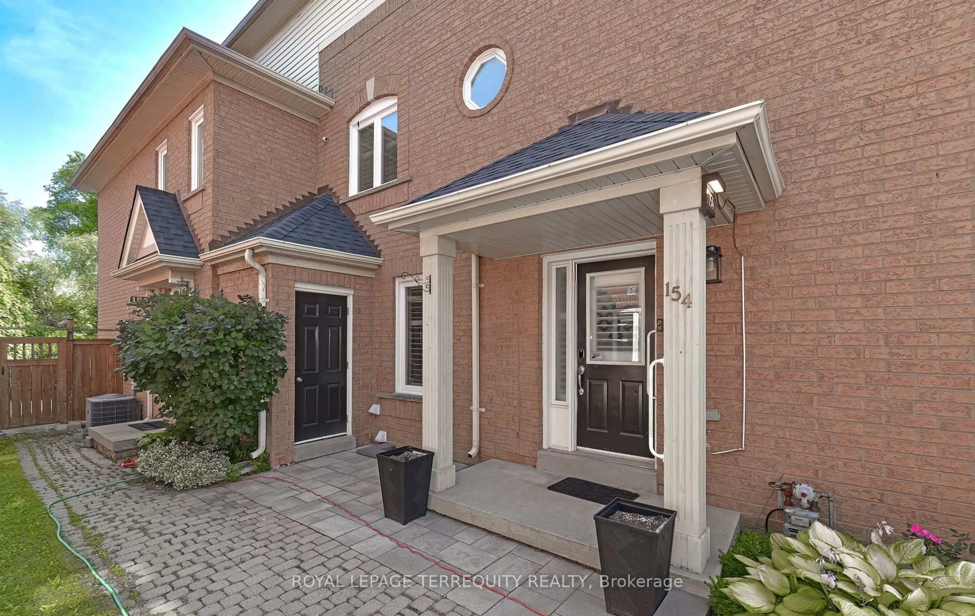 Home with brick exterior material, street for 154 Pressed Brick Dr, Brampton Ontario L6V 4K6