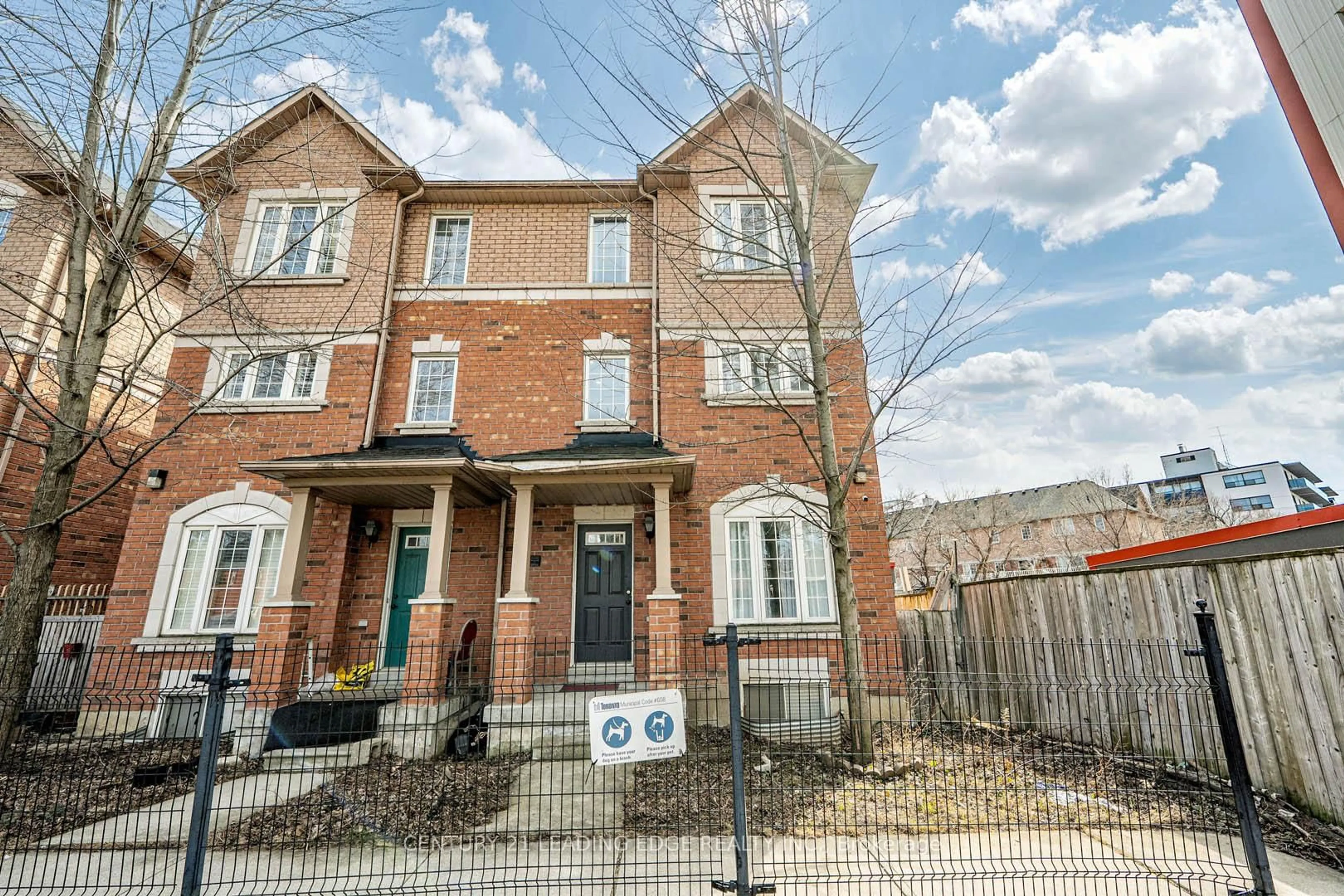Home with brick exterior material, street for 75 Elphick Lane, Toronto Ontario M9N 4A2