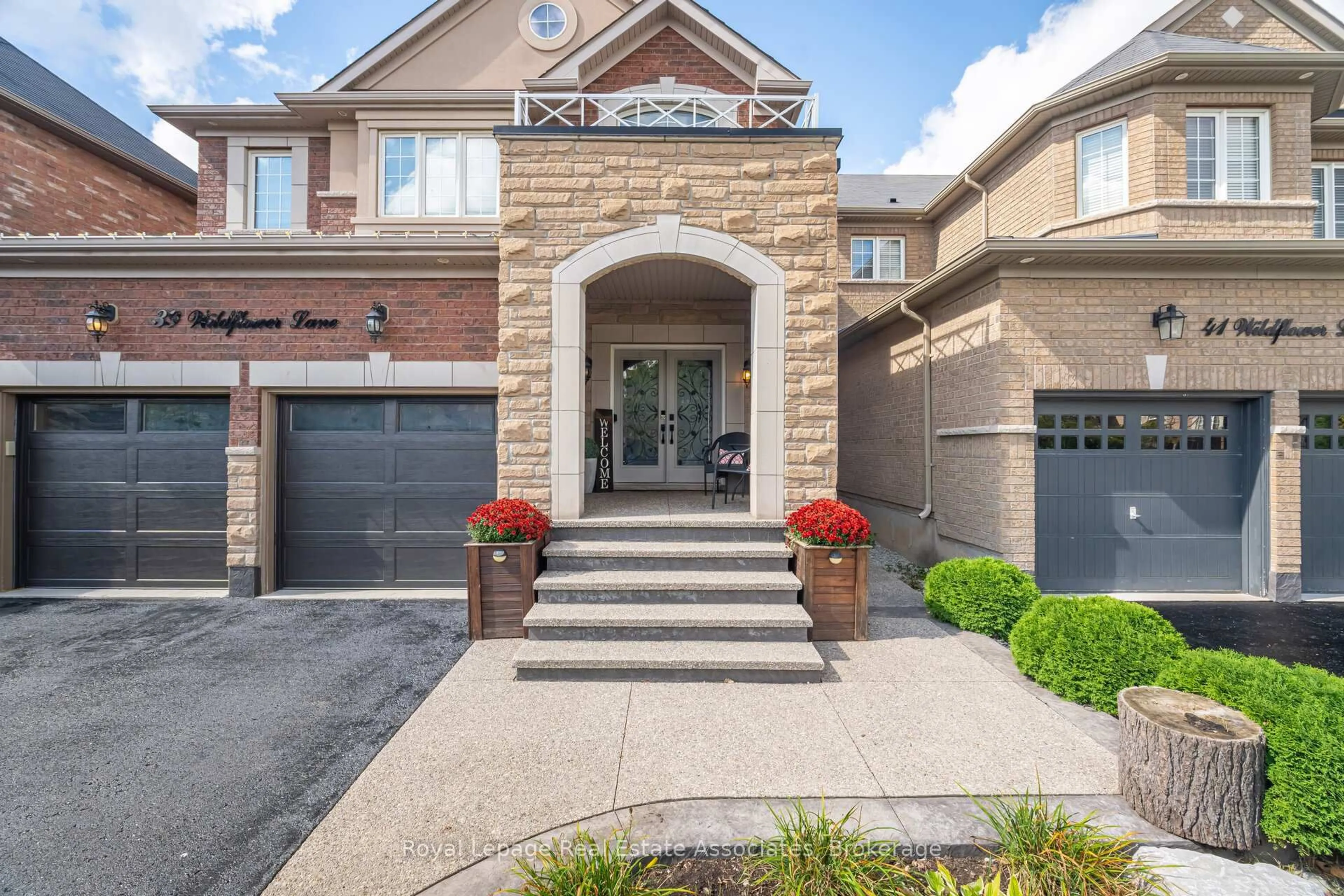 Home with brick exterior material, street for 39 Wildflower Lane, Halton Hills Ontario L7G 0H8