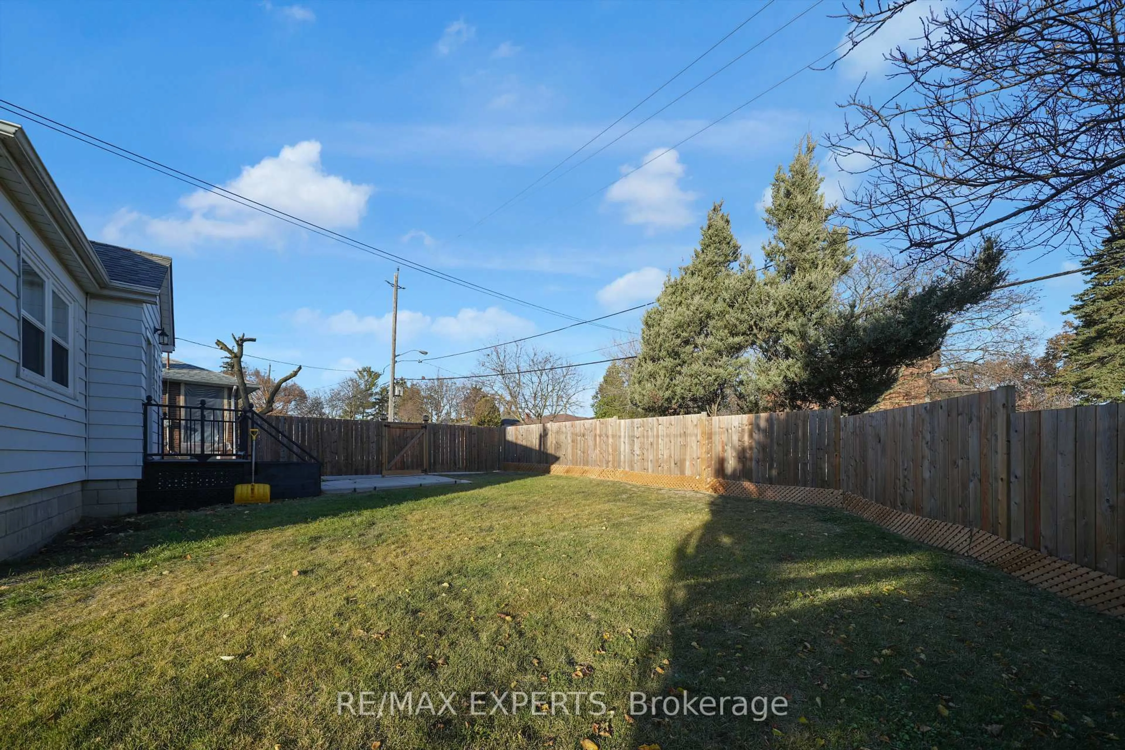 A pic from outside/outdoor area/front of a property/back of a property/a pic from drone, forest/trees view for 4 Larchmere Ave, Toronto Ontario M9L 2N1