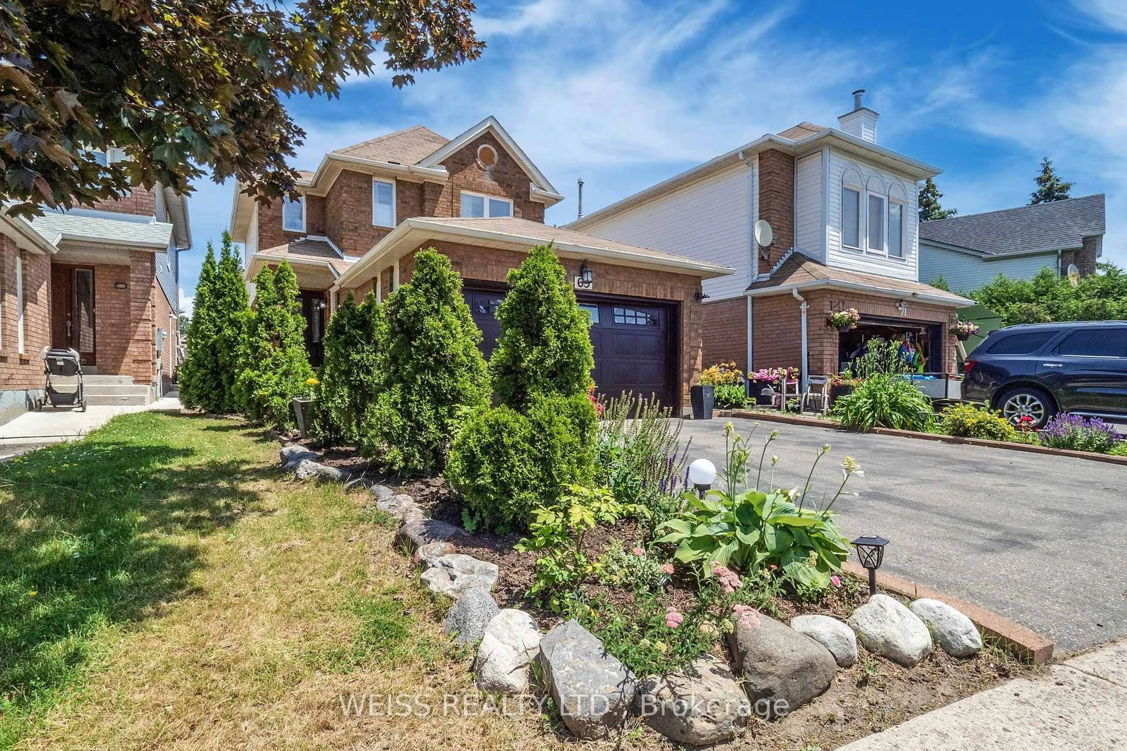 Home with brick exterior material, street for 69 Wooliston Cres, Brampton Ontario L6Y 4J4