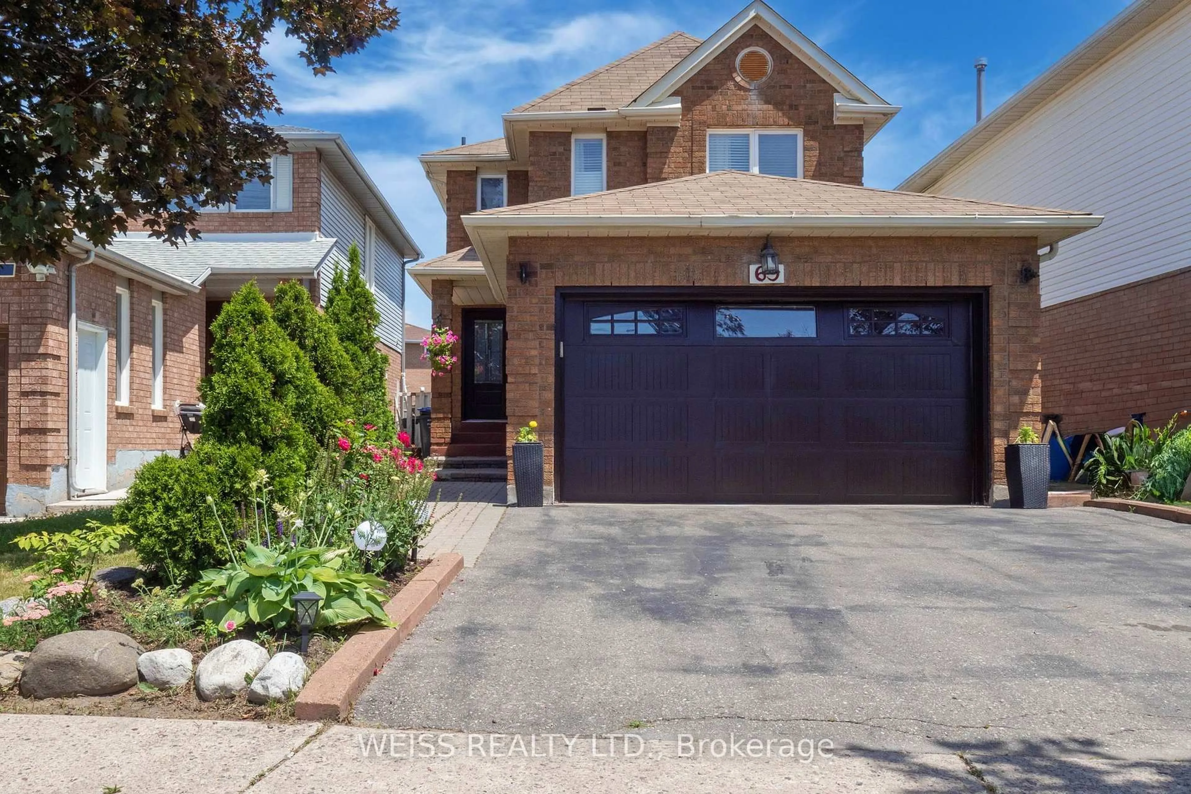 Home with brick exterior material, street for 69 Wooliston Cres, Brampton Ontario L6Y 4J4