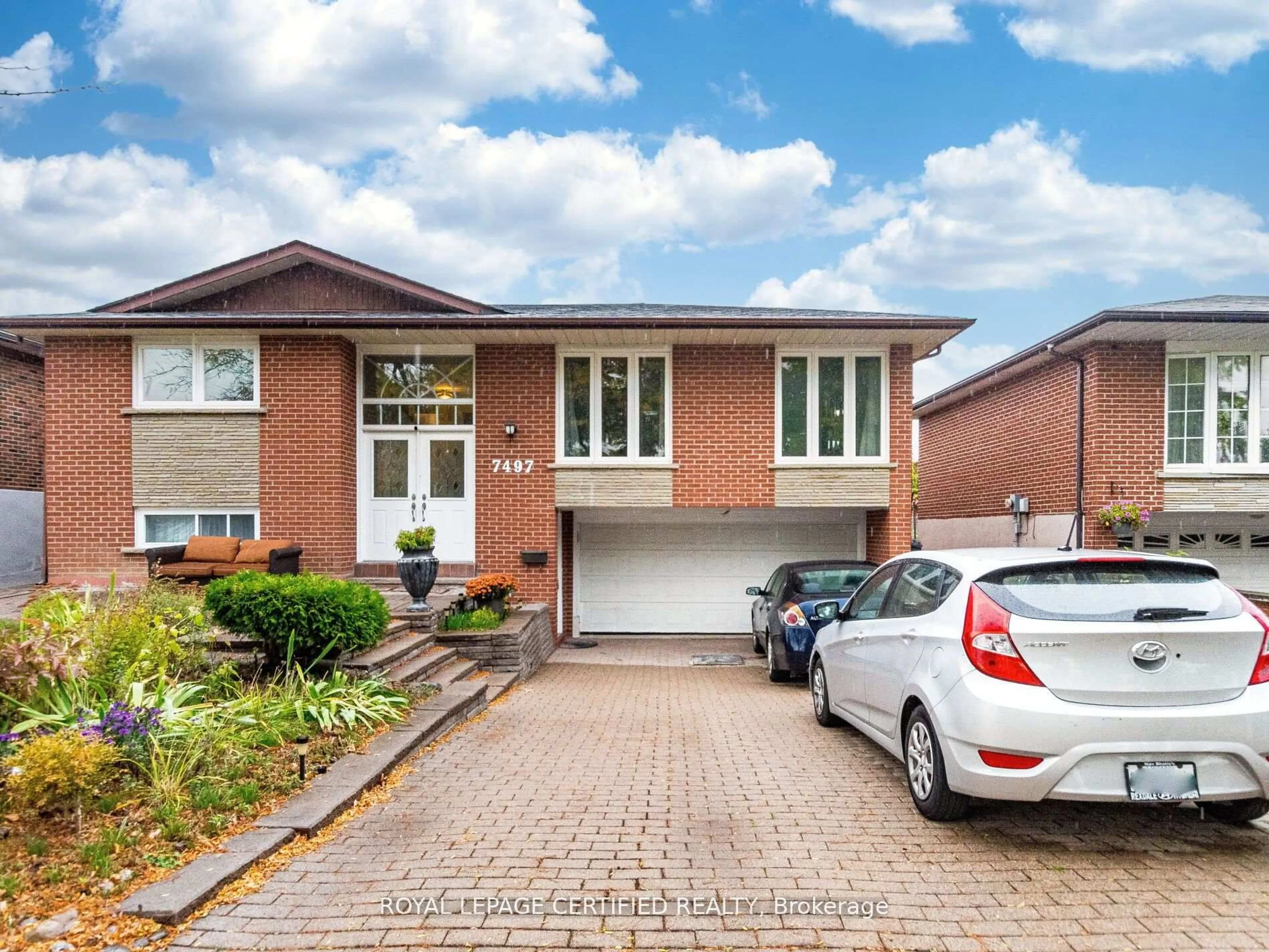 Home with brick exterior material, street for 7497 Middleshire Dr, Mississauga Ontario L4T 3S3