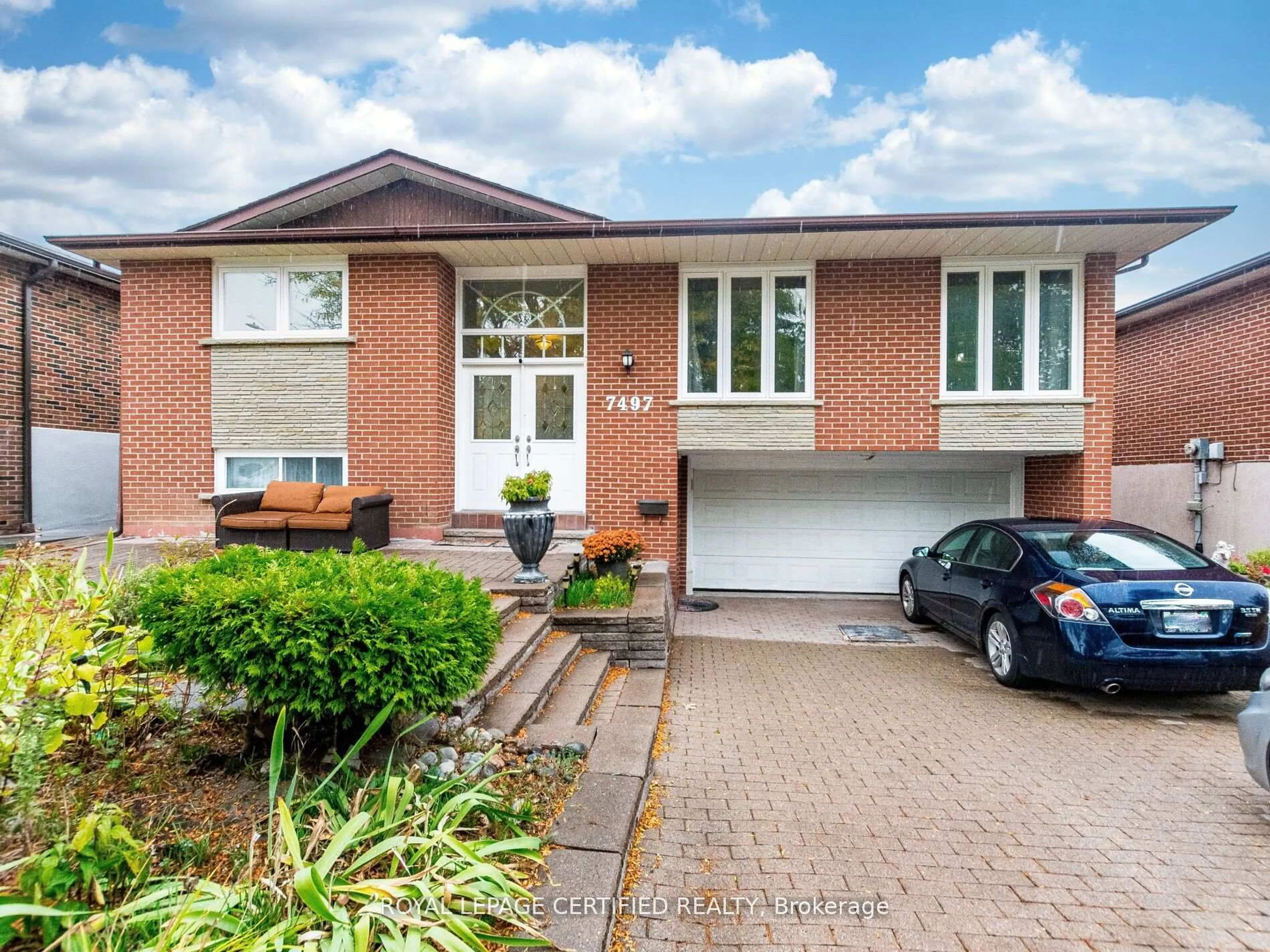Home with brick exterior material, street for 7497 Middleshire Dr, Mississauga Ontario L4T 3S3