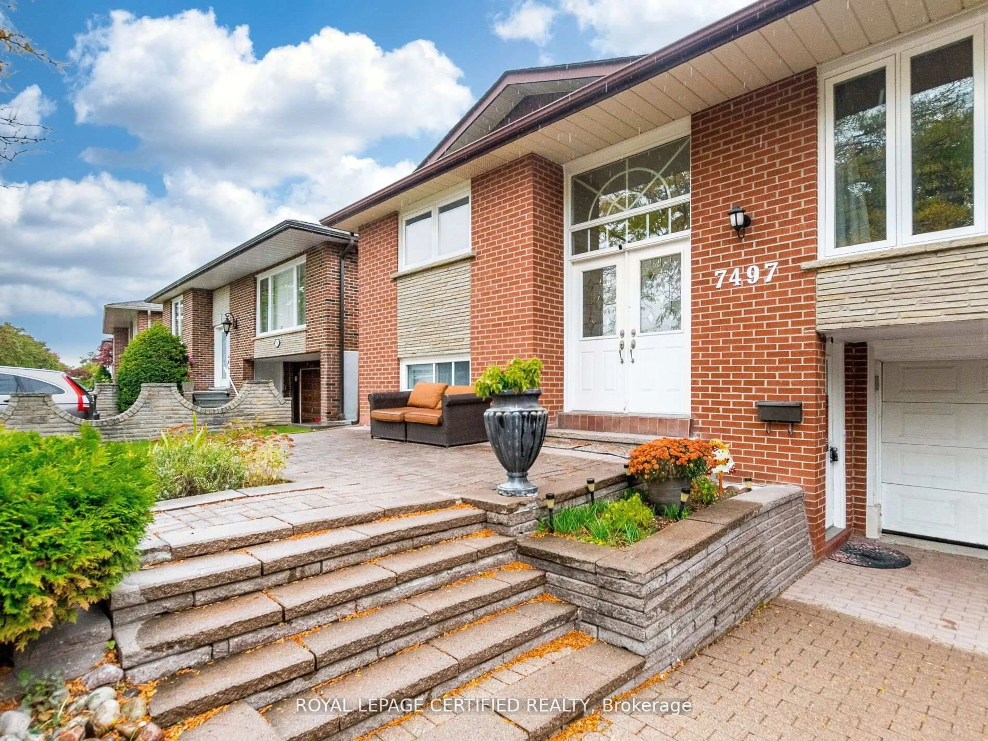 Home with brick exterior material, street for 7497 Middleshire Dr, Mississauga Ontario L4T 3S3