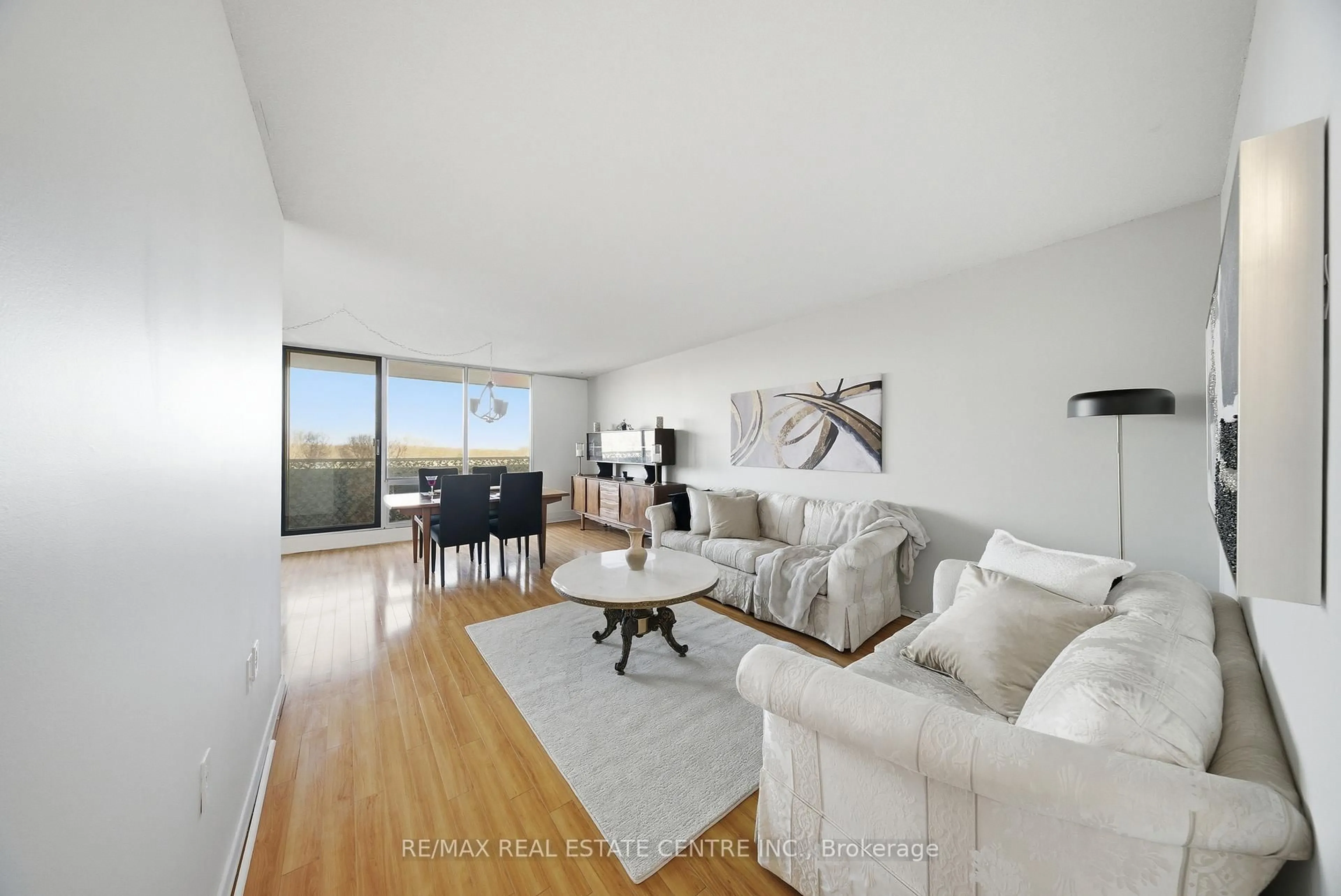 Living room with furniture, unknown for 2055 Upper Middle Rd #602, Burlington Ontario L7P 3P4