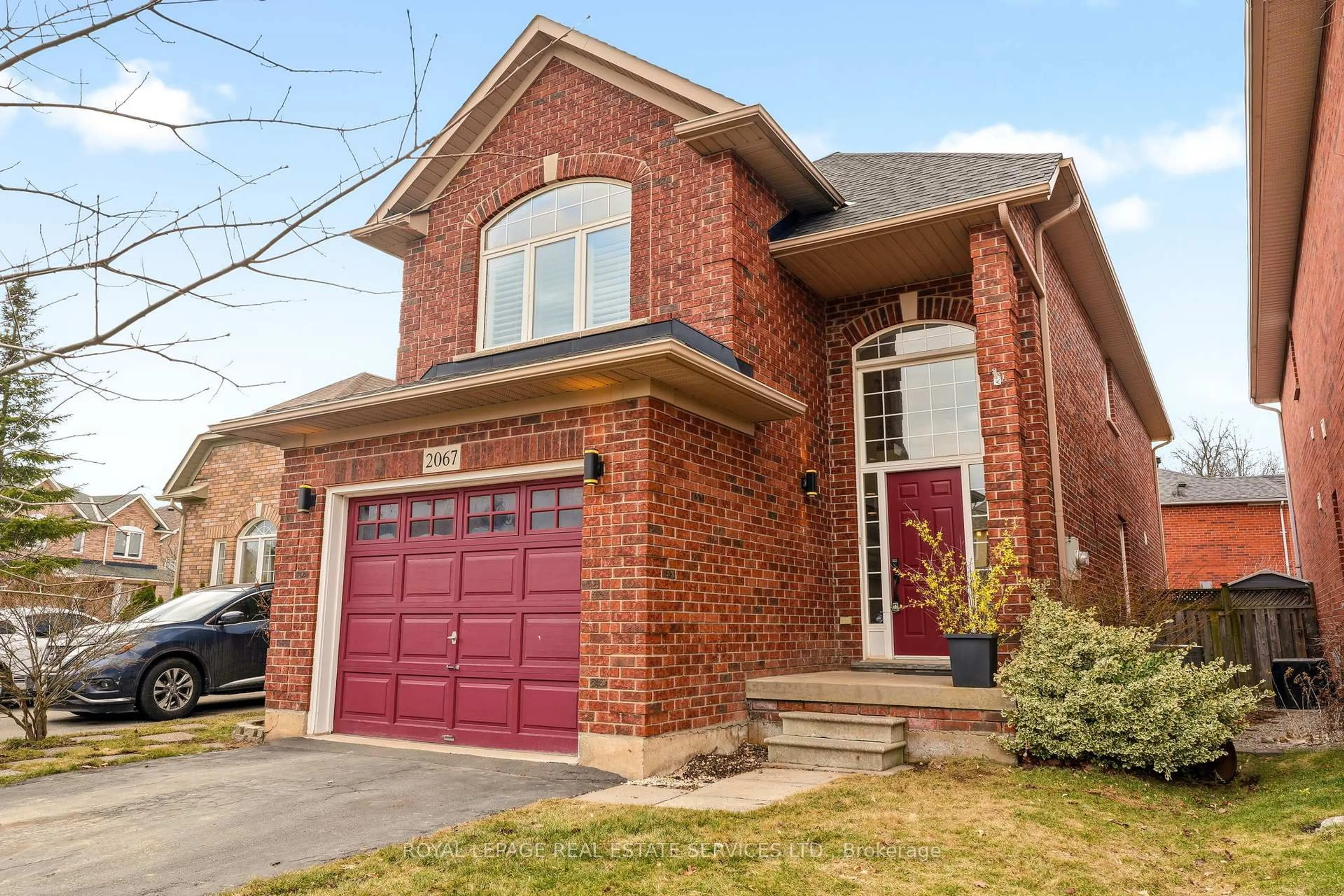 Home with brick exterior material, street for 2067 Springdale Rd, Oakville Ontario L6M 4C7