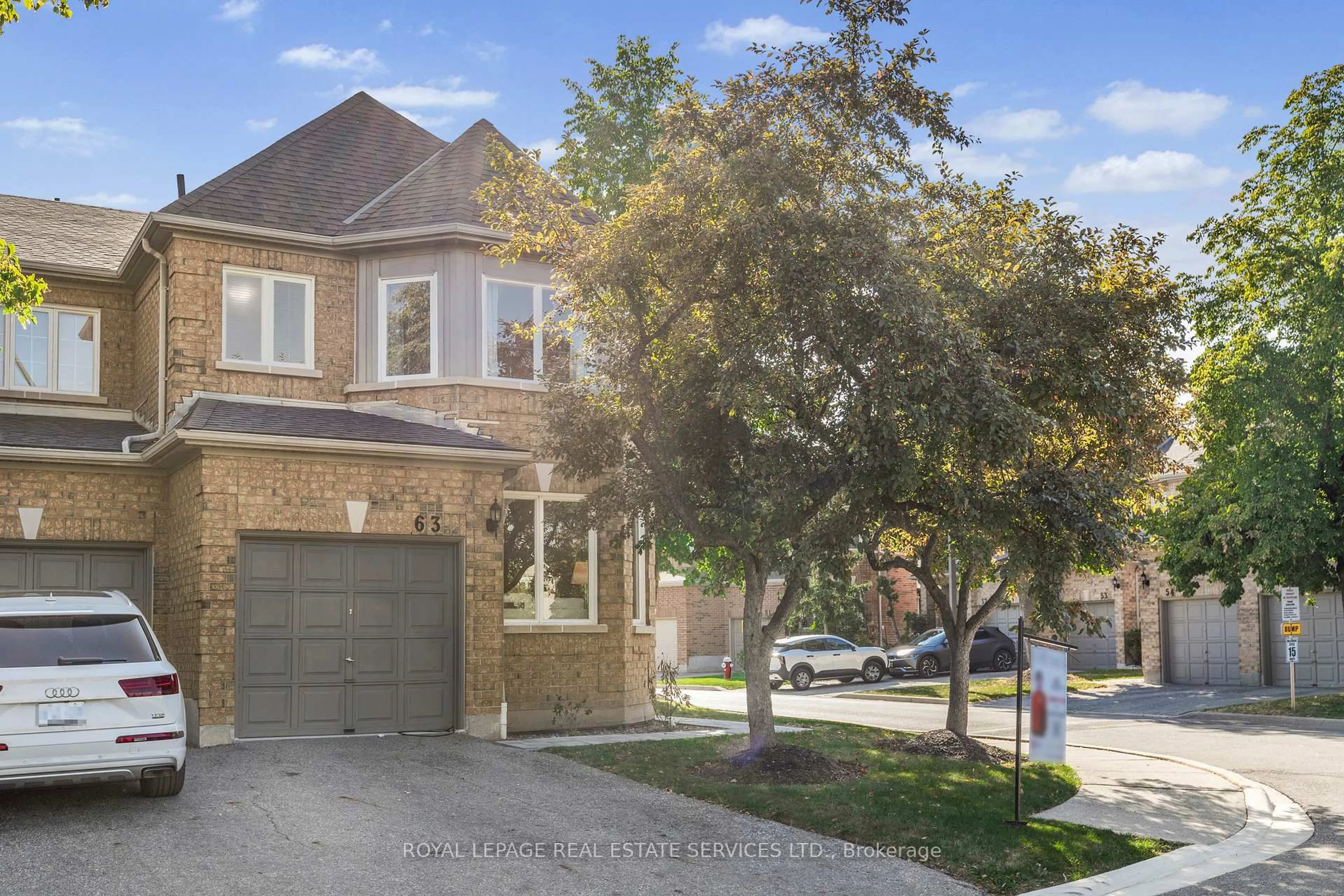 Home with brick exterior material, street for 5230 Glen Erin Dr #63, Mississauga Ontario L5M 5Z7