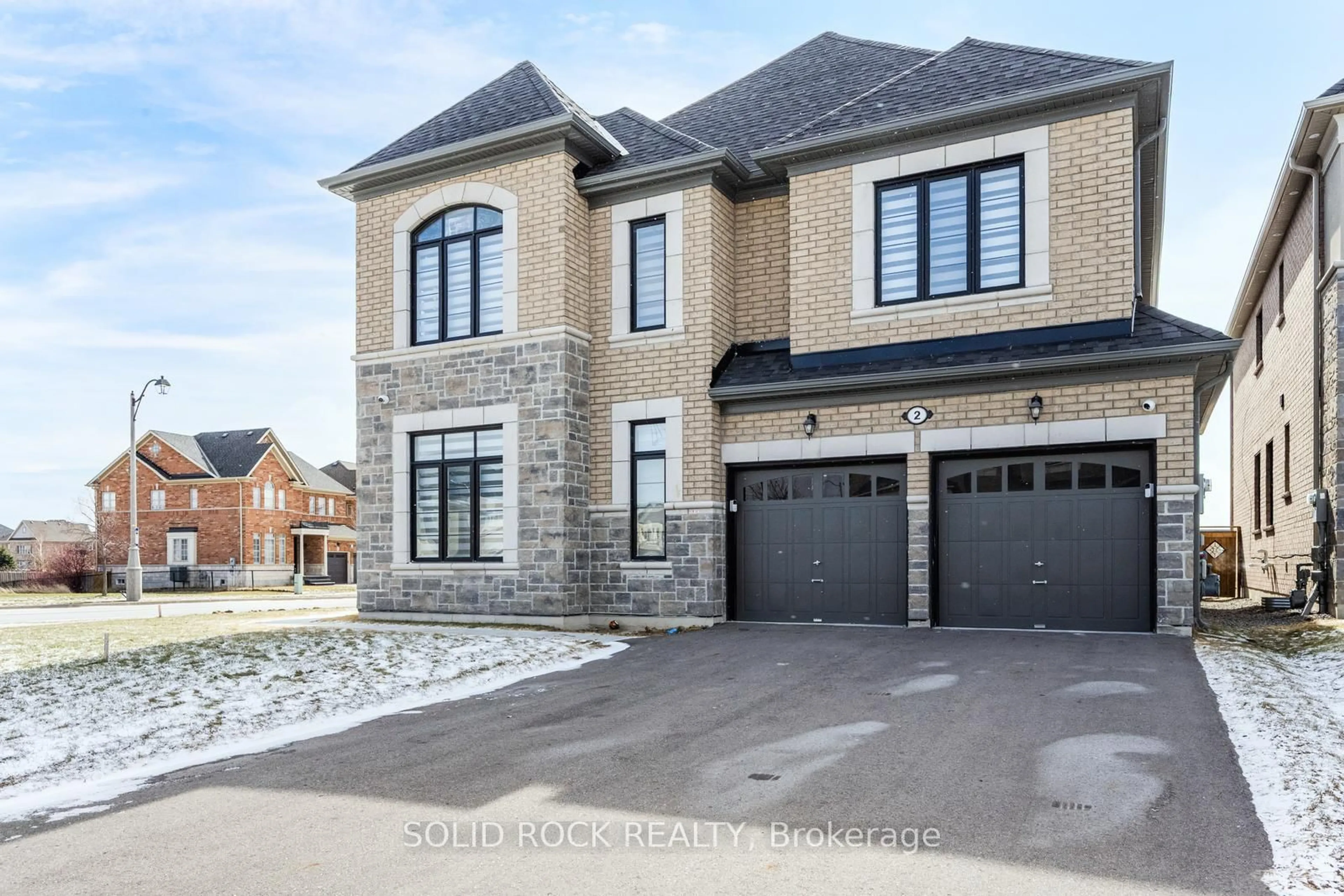 Home with brick exterior material, street for 2 Catherwood Crt, Brampton Ontario L6P 2W1