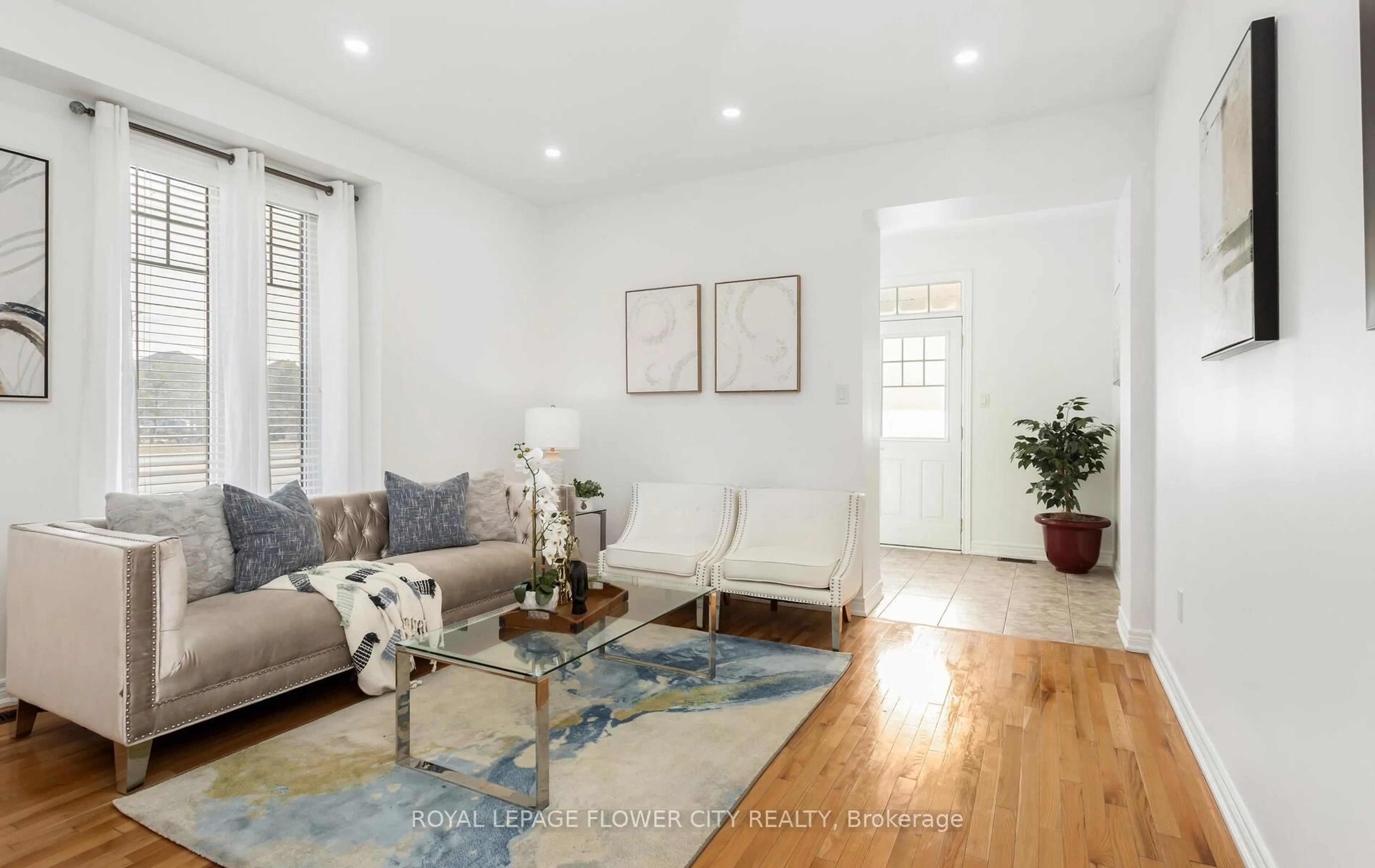 Living room with furniture, wood/laminate floor for 2 Archville St, Brampton Ontario L6Y 5Y5